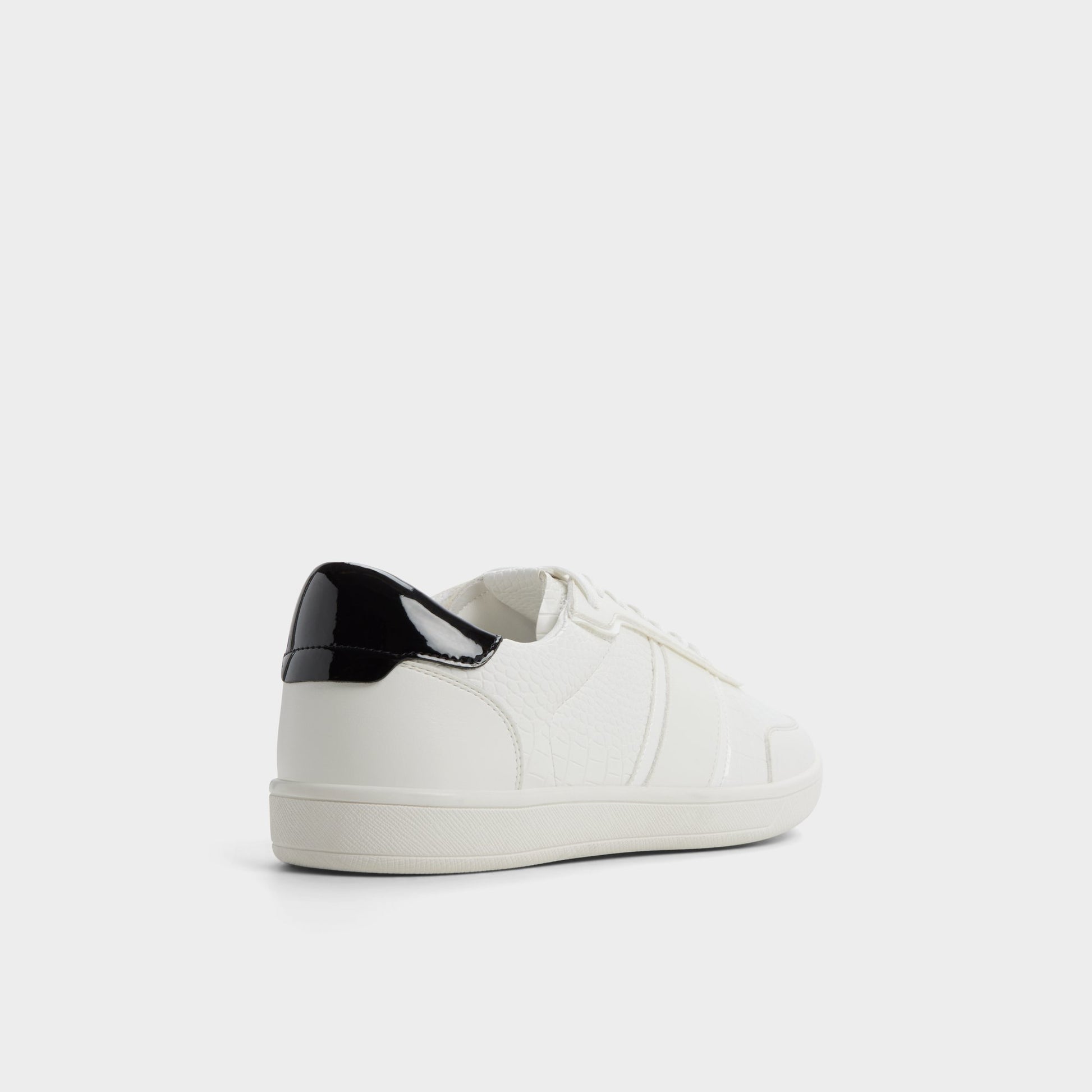 Three-quarter angle of White Combo Uptown Low top sneaker's back side