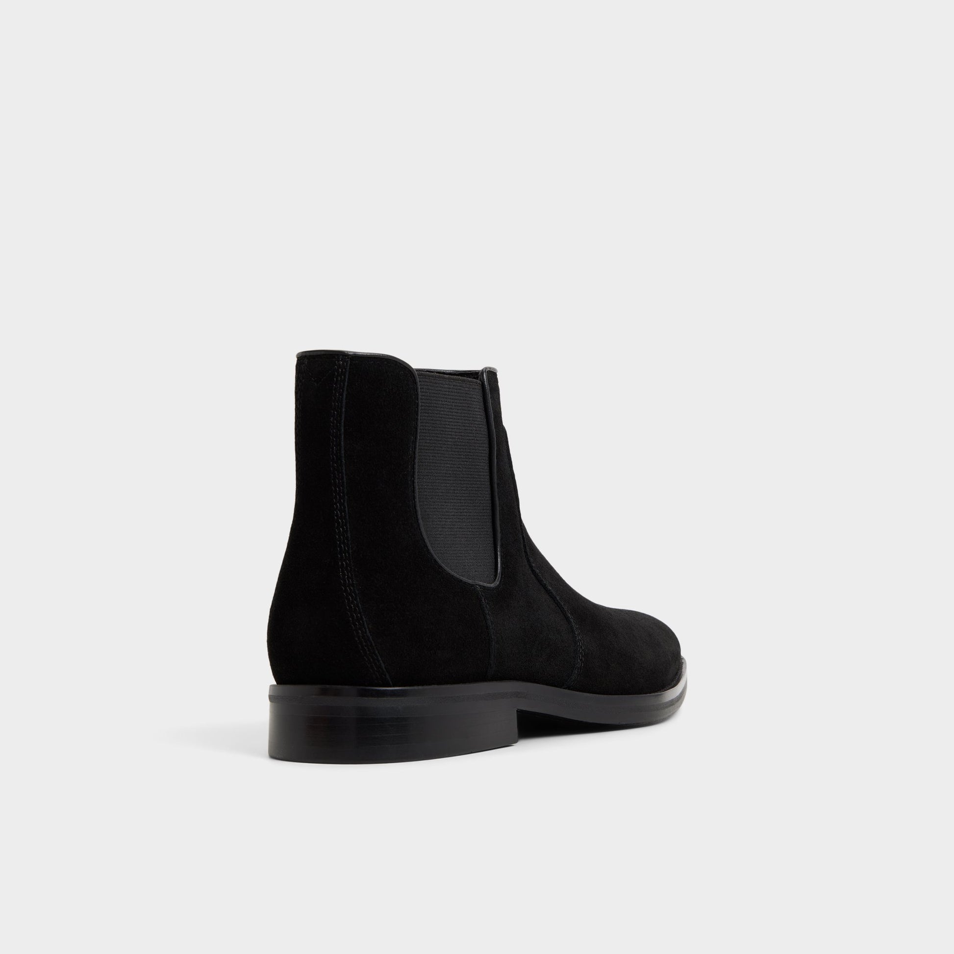 Three-quarter angle of Other Black Hunter Chelsea boot's back side