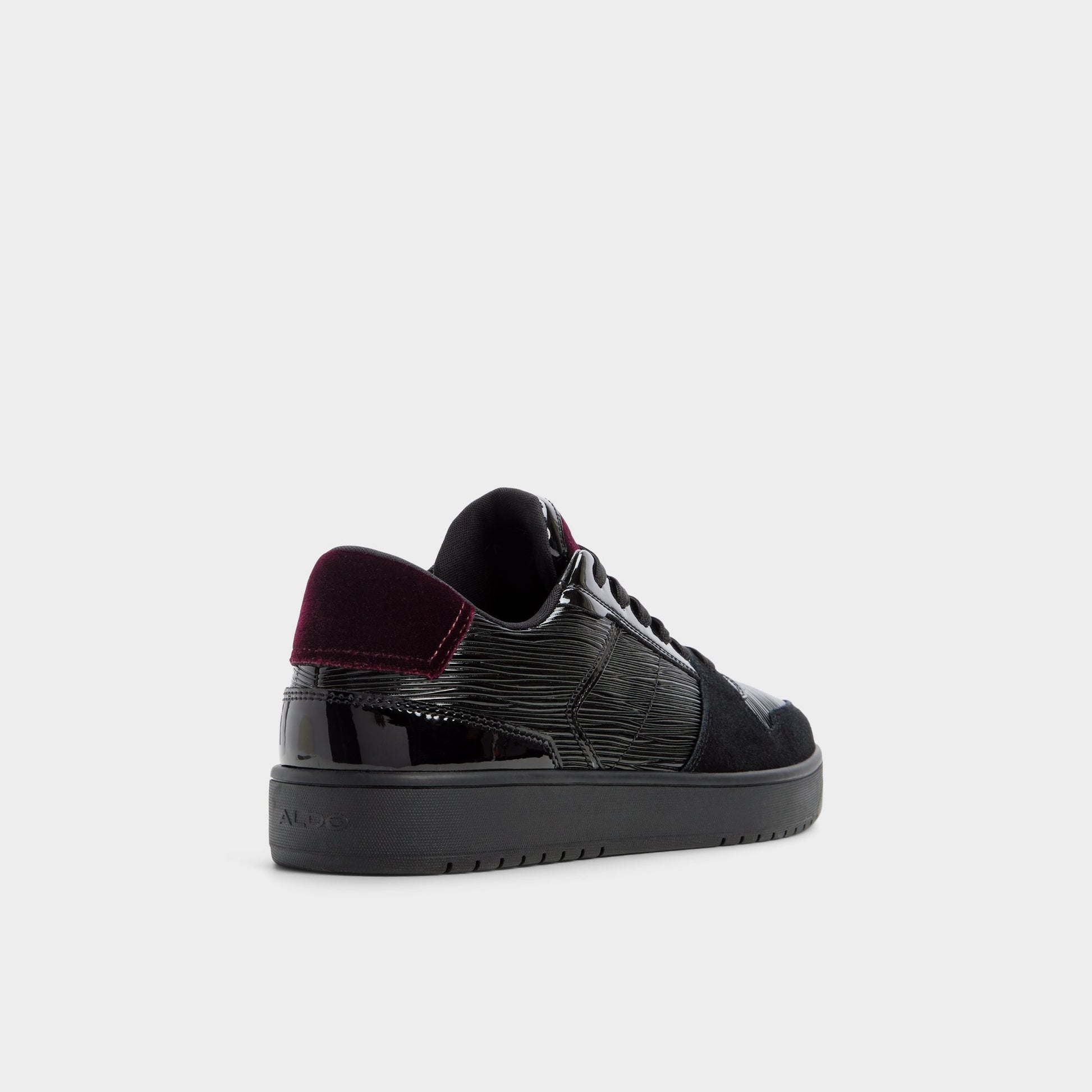 Three-quarter angle of Black combo Zethan Low top sneaker's back side