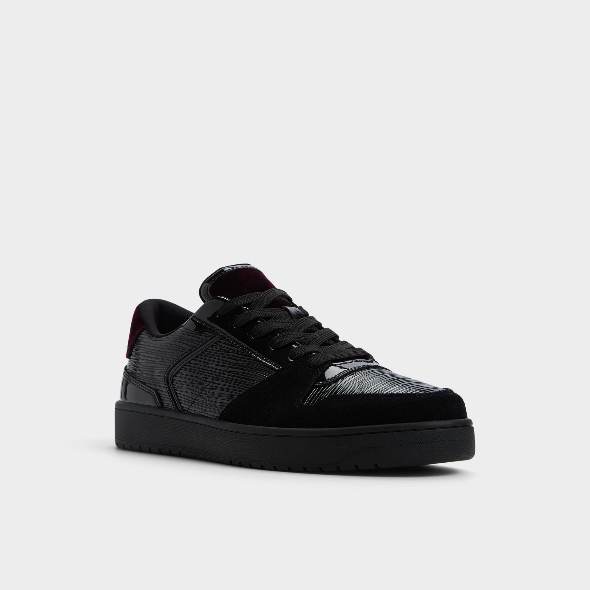 Three-quarter angle of Black Combo Zethan Low top sneaker's front side