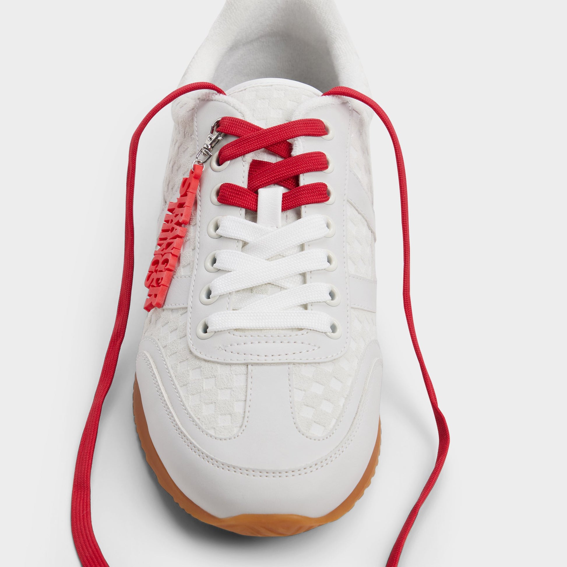 Highlighted view of a pair of Bone Thevoid Mens sneakers
