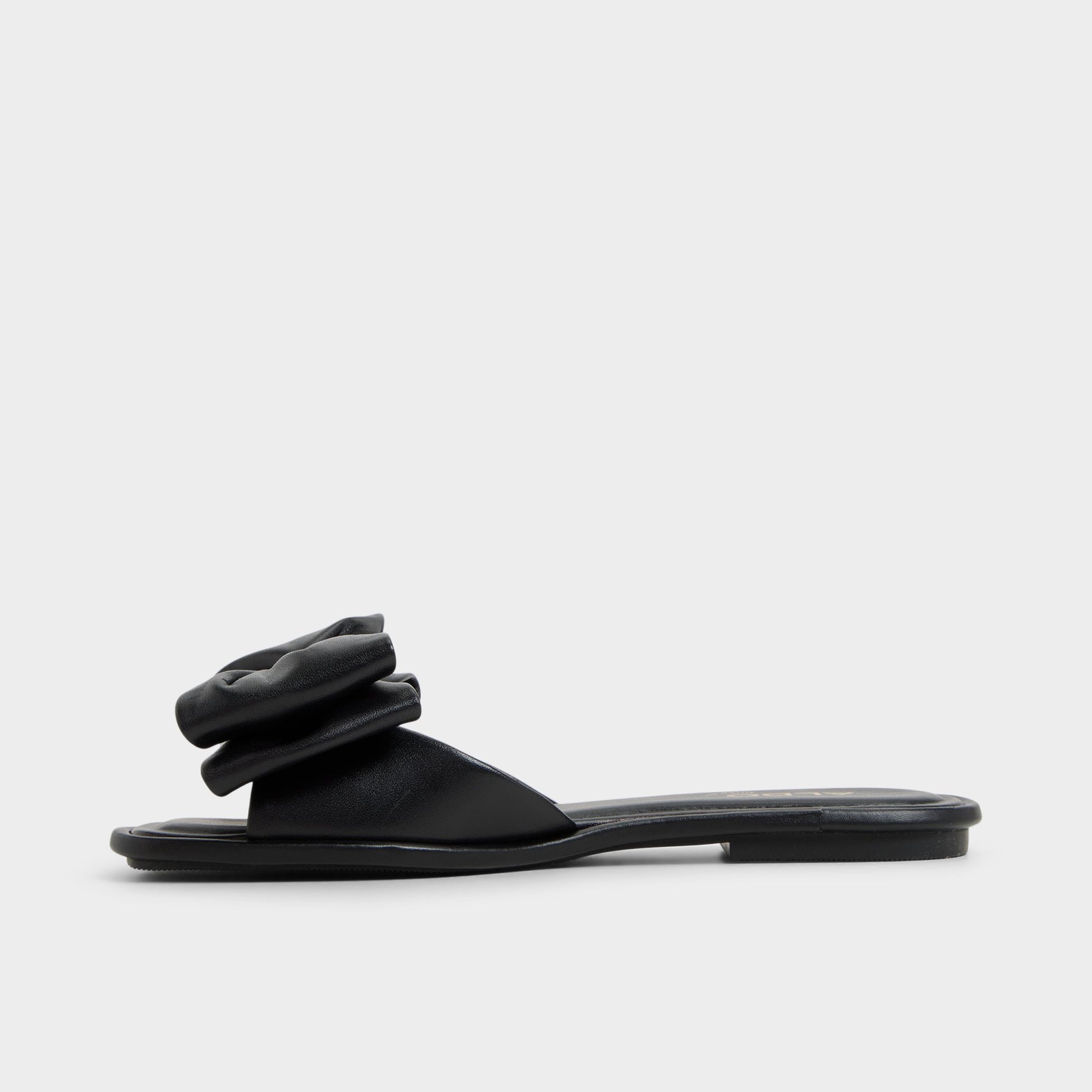 Side view of Black Bowetta Slide sandal