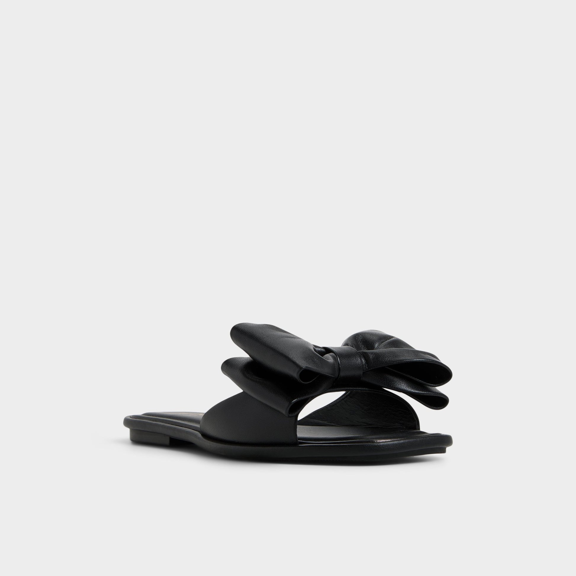 Three-quarter angle of Black Bowetta Slide sandal's front side