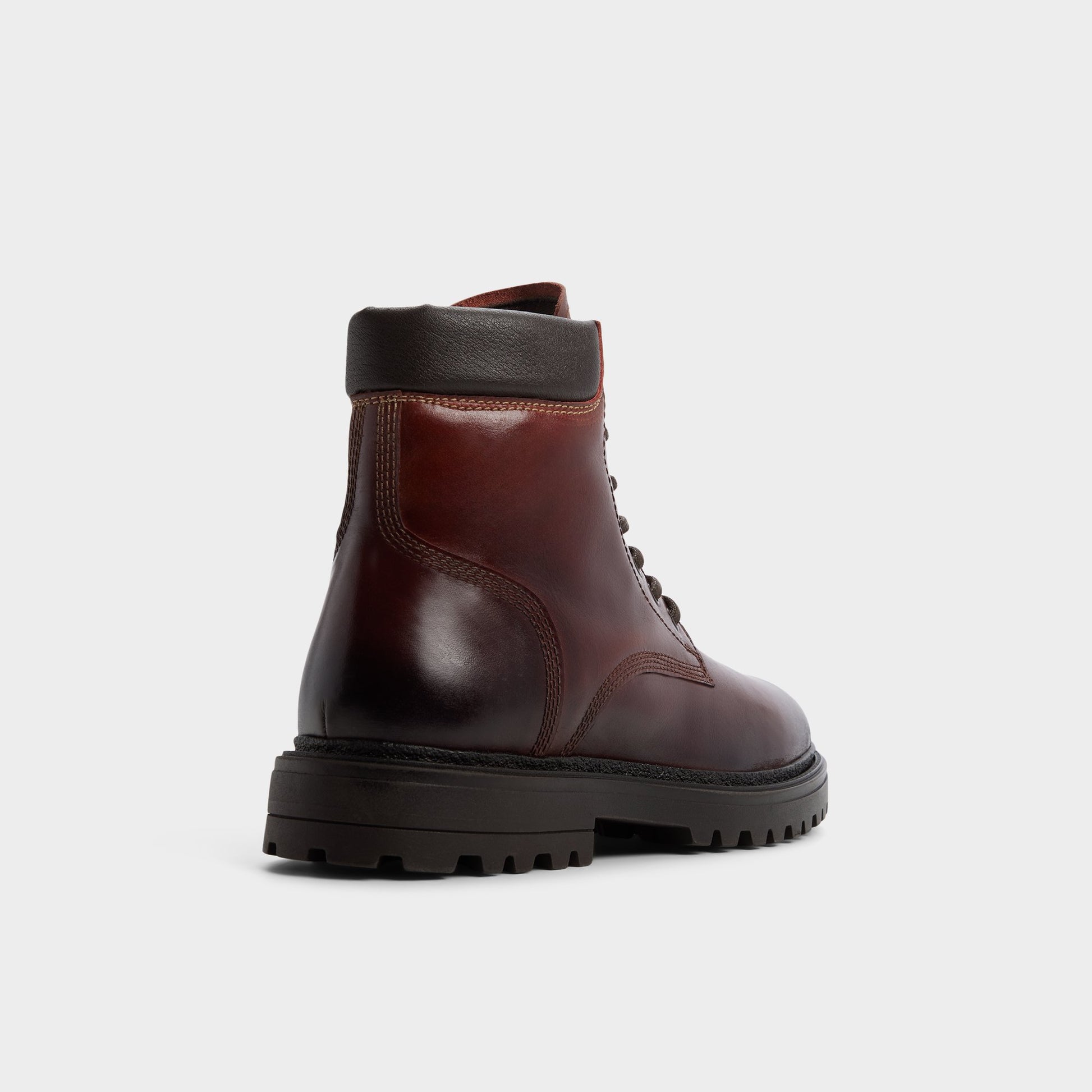 Three-quarter angle of Medium brown Draco Combat boot's back side