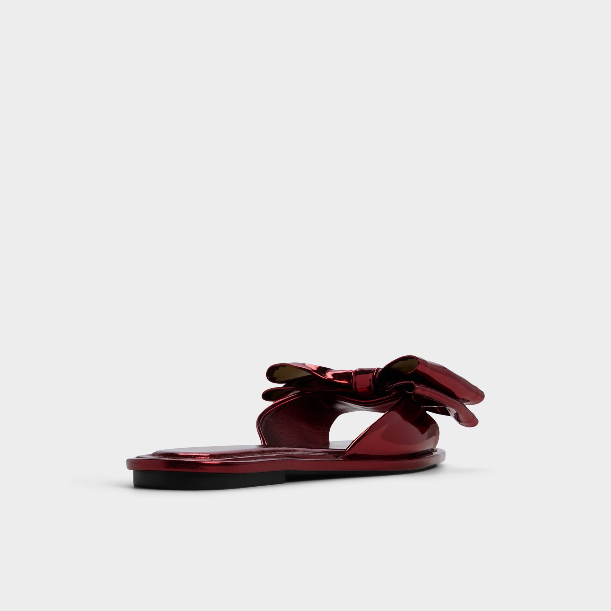 Three-quarter angle of Medium Red Bowetta Slide sandal's back side