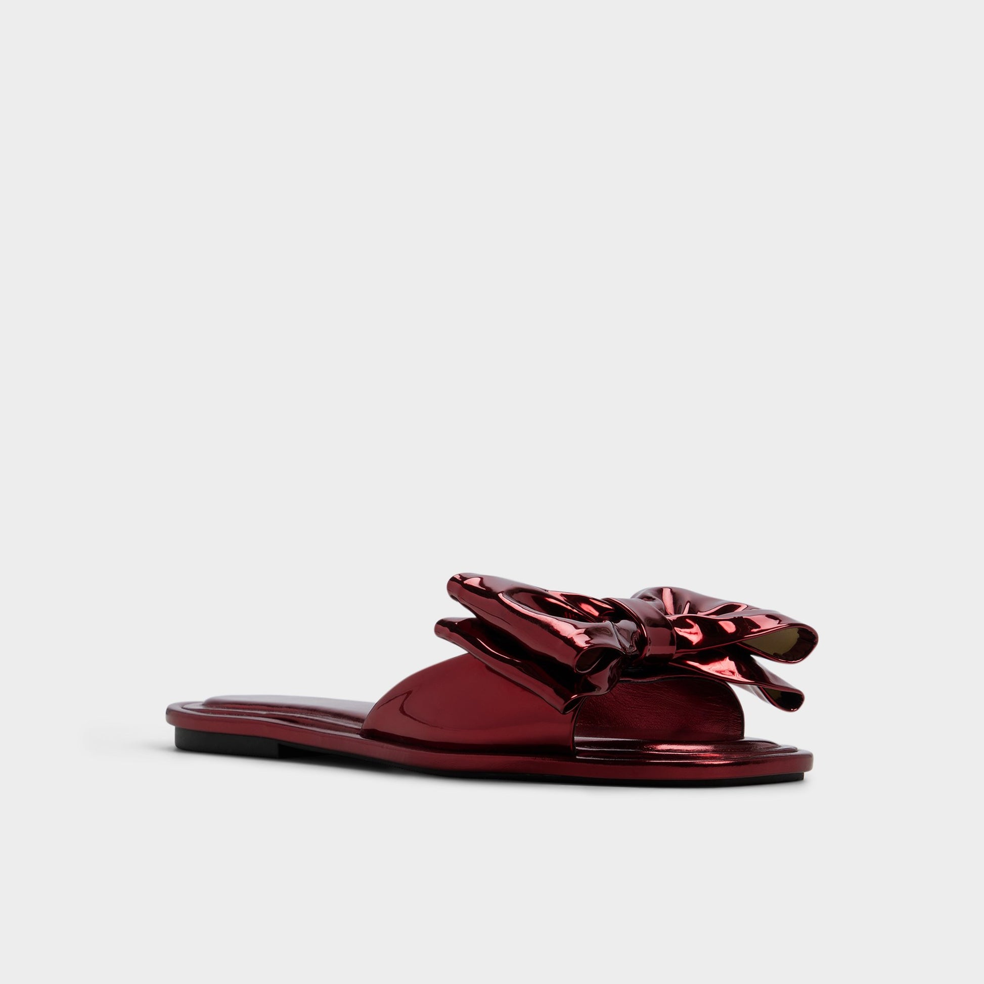 Three-quarter angle of Medium Red Bowetta Slide sandal's front side