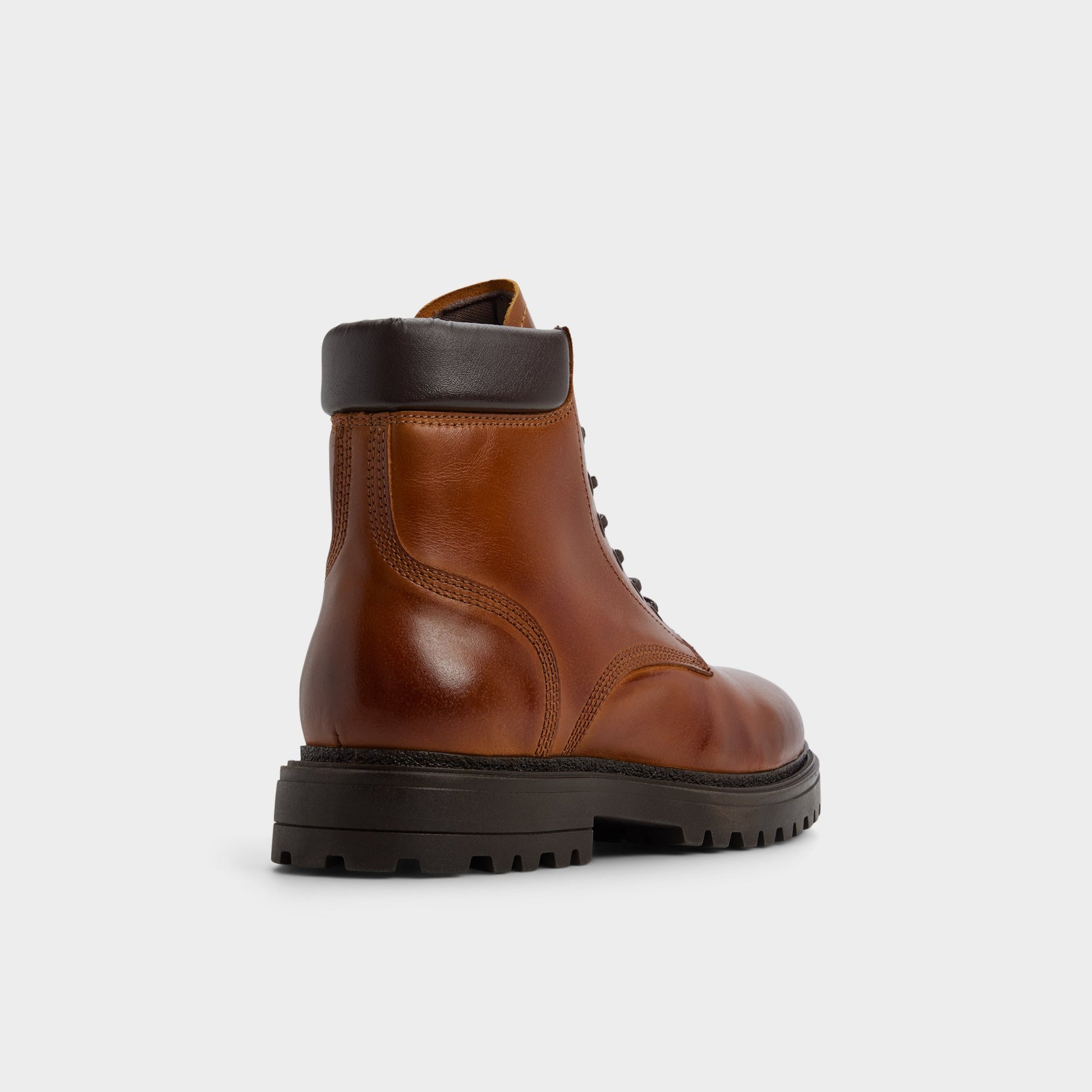 Three-quarter angle of Cognac Draco Combat boot's back side