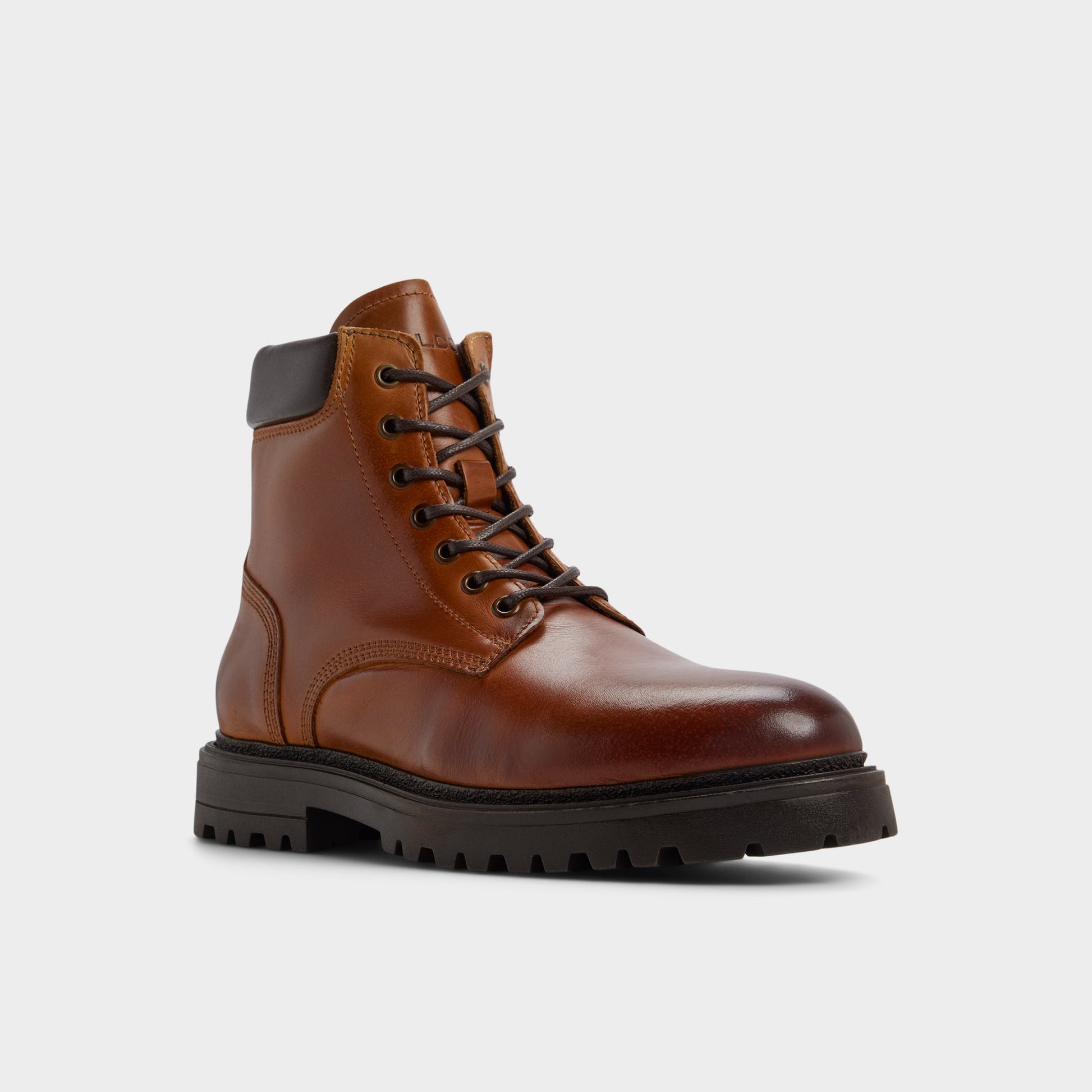Three-quarter angle of Cognac Draco Combat boot's front side