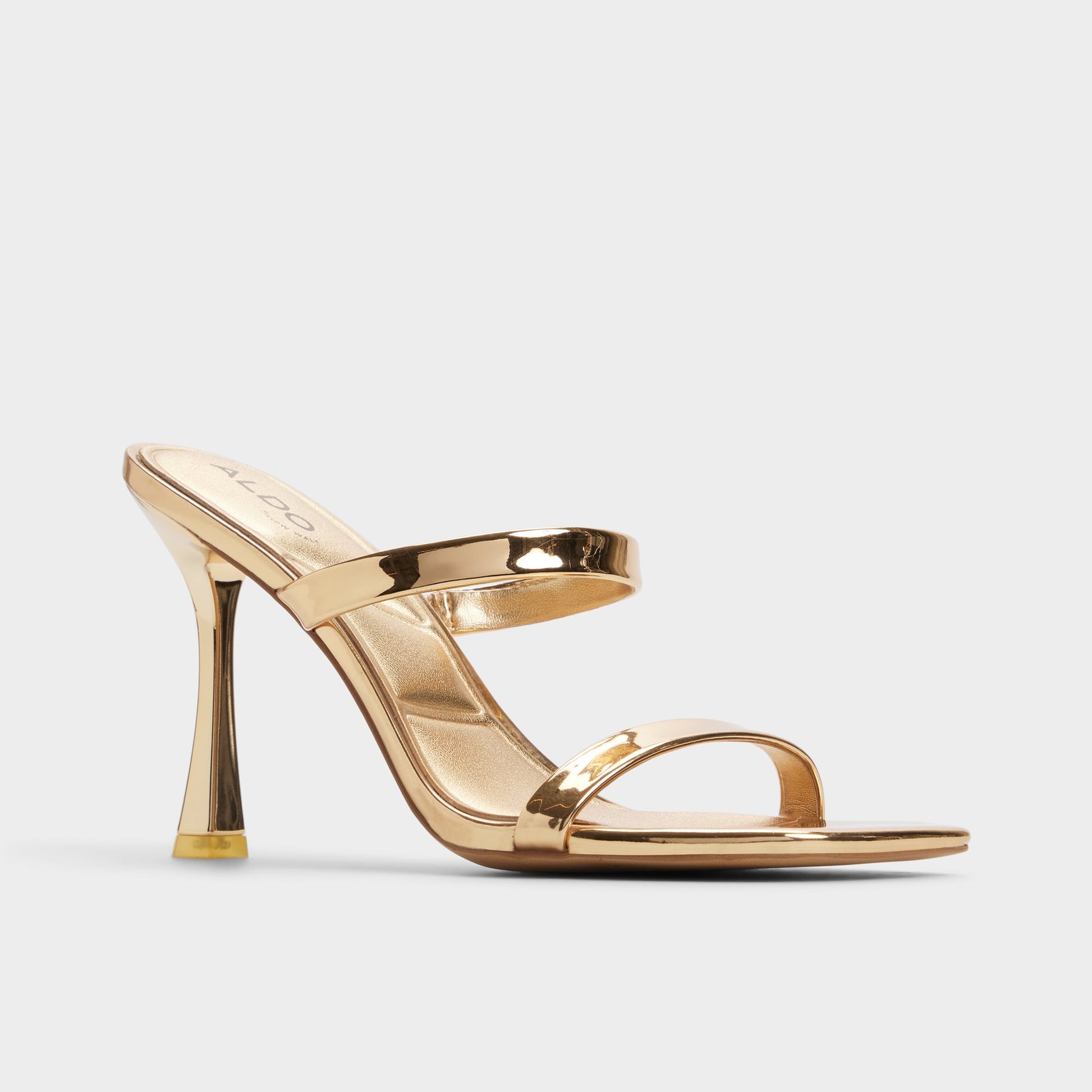 Three-quarter angle of Gold Evalyn Strappy heeled sandal's front side