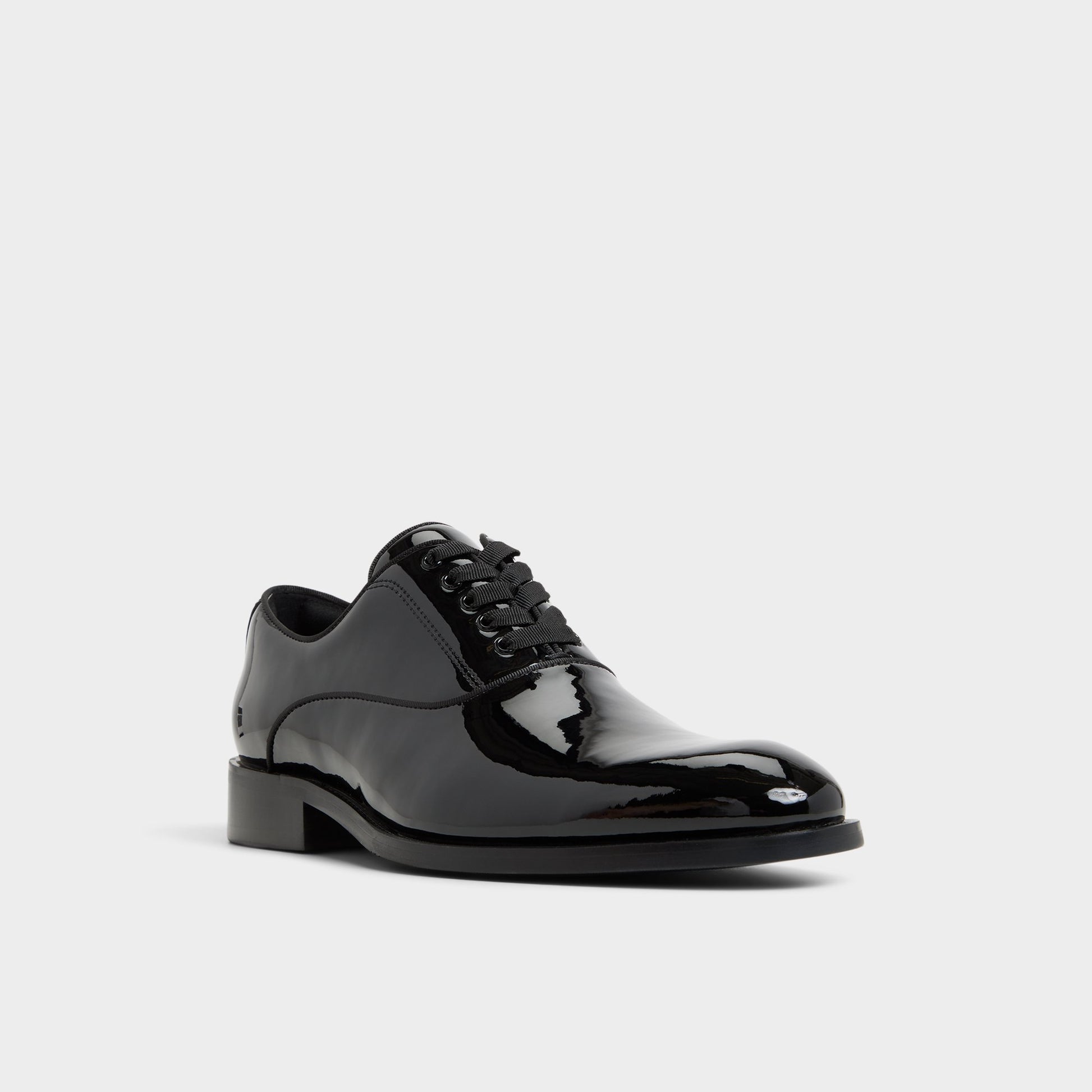 Three-quarter angle of Open black Braz Oxford shoe's front side