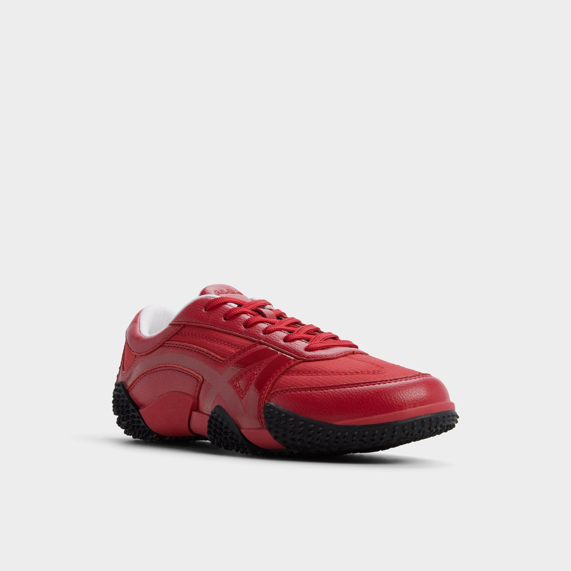 Three-quarter angle of Red Drive Low top sneaker's front side