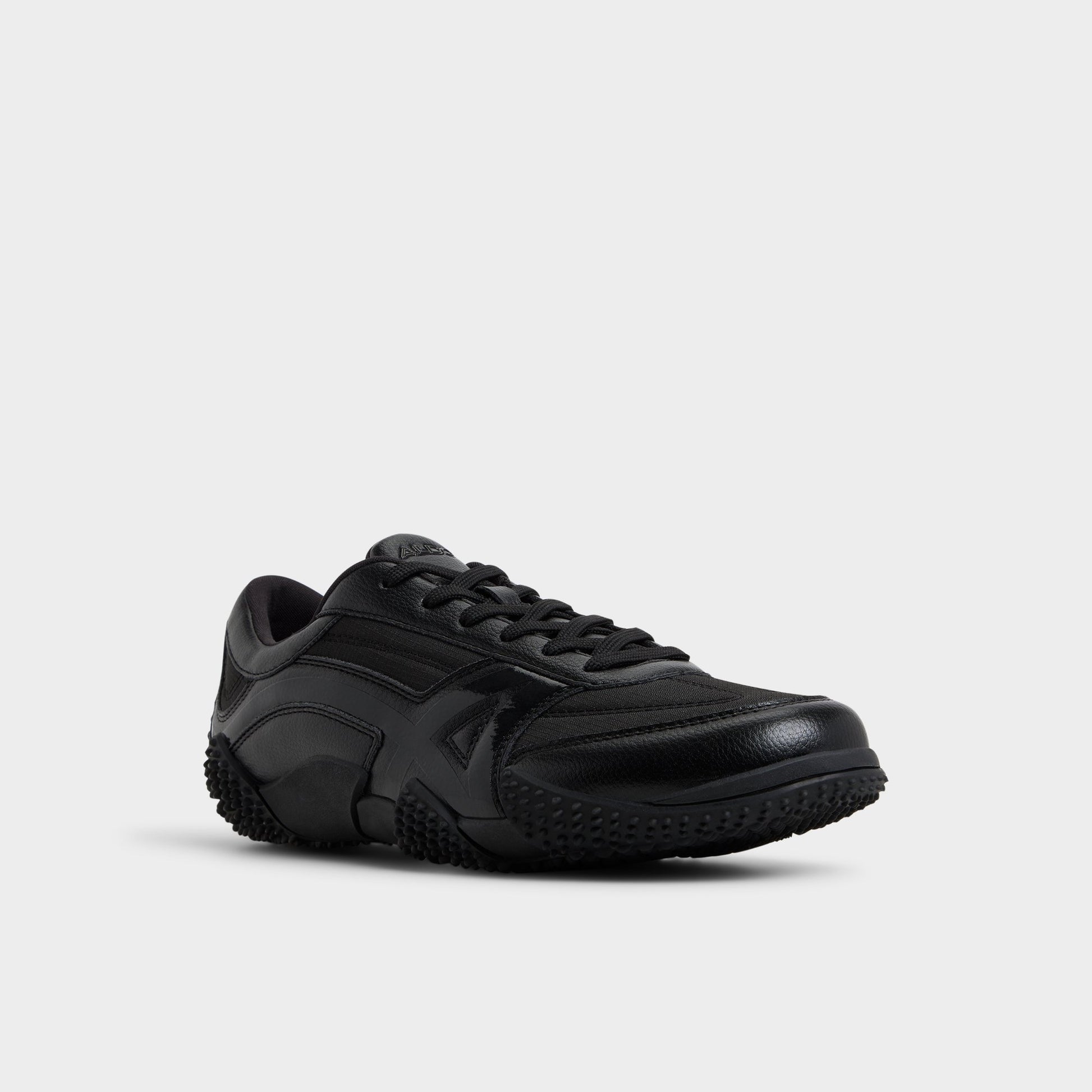 Three-quarter angle of Black Drive Low top sneaker's front side