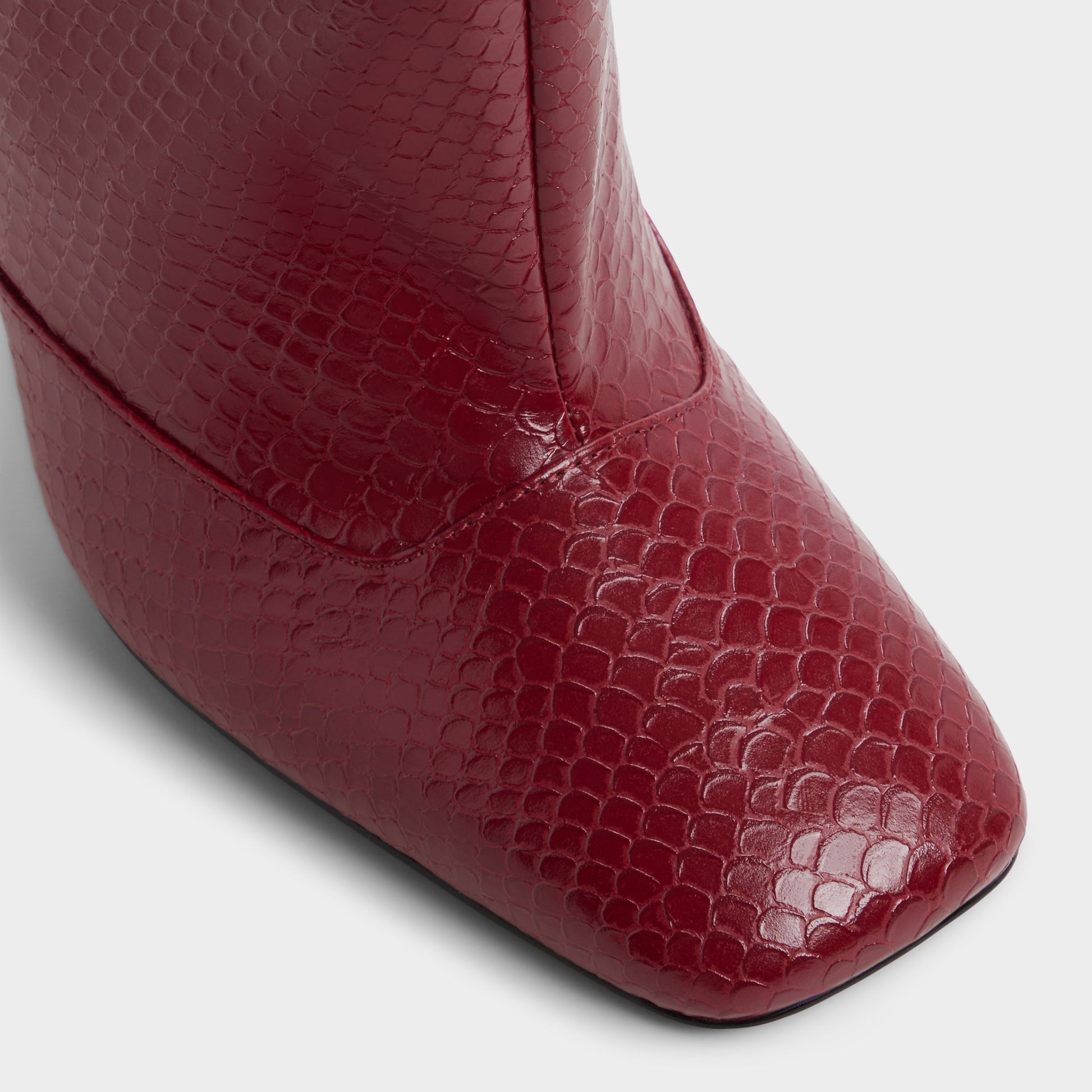 Close-up of the Dark red Aleena Knee-high boot