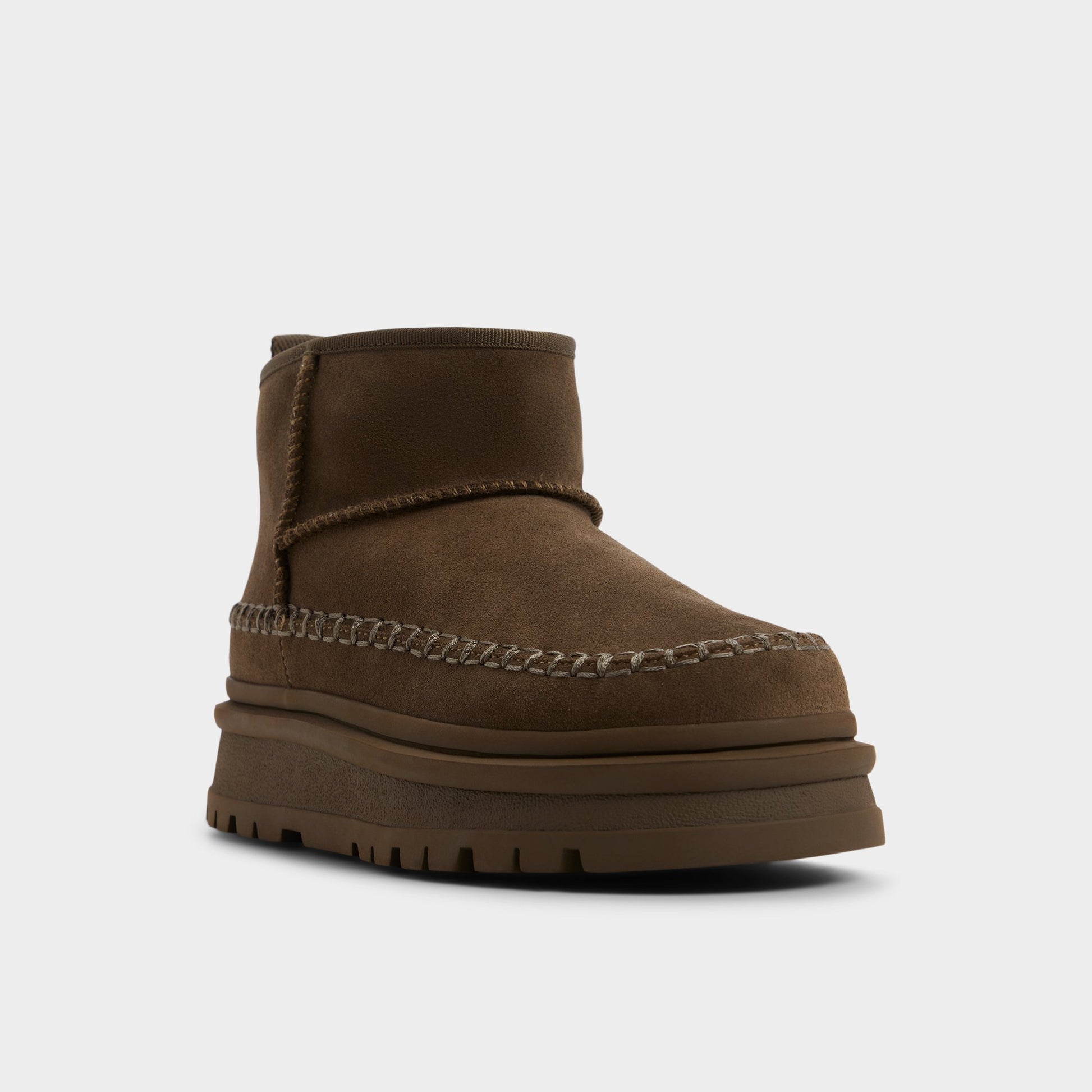 Three-quarter angle of Dark Green Milanie Ankle boot's front side