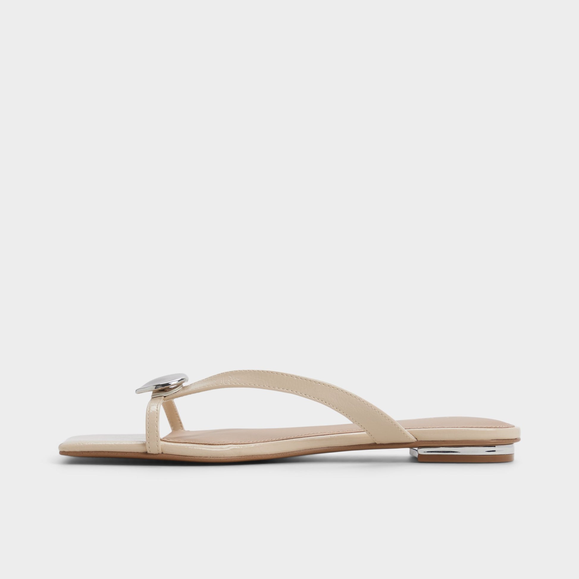 Side view of Beige Iliria Slide sandal