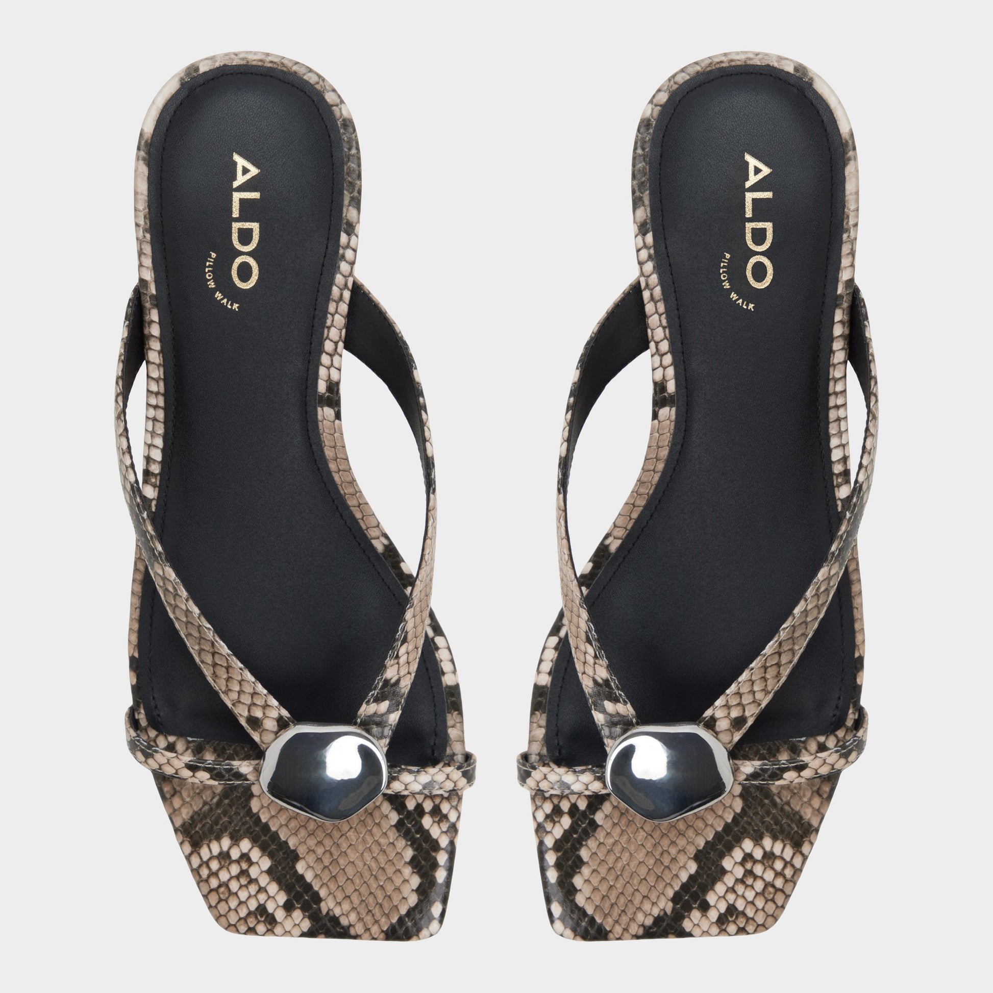 Top-down view of the White/black Iliria Slide sandal