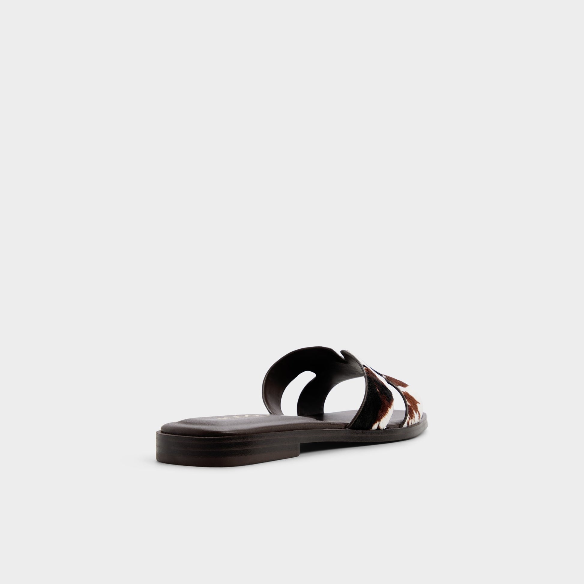 Three-quarter angle of Open brown Itsandal Slide sandal's back side