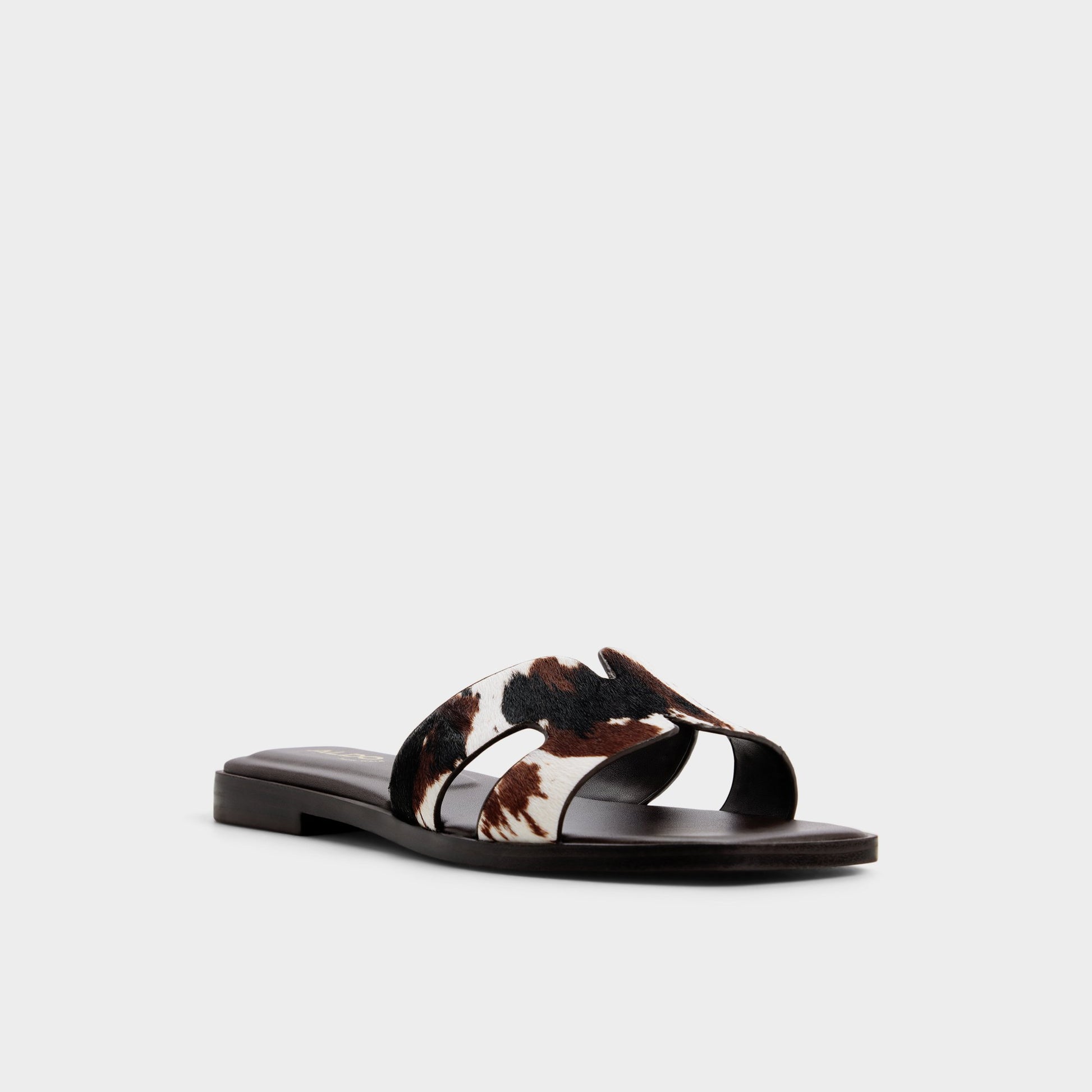 Three-quarter angle of Open brown Itsandal Slide sandal's front side