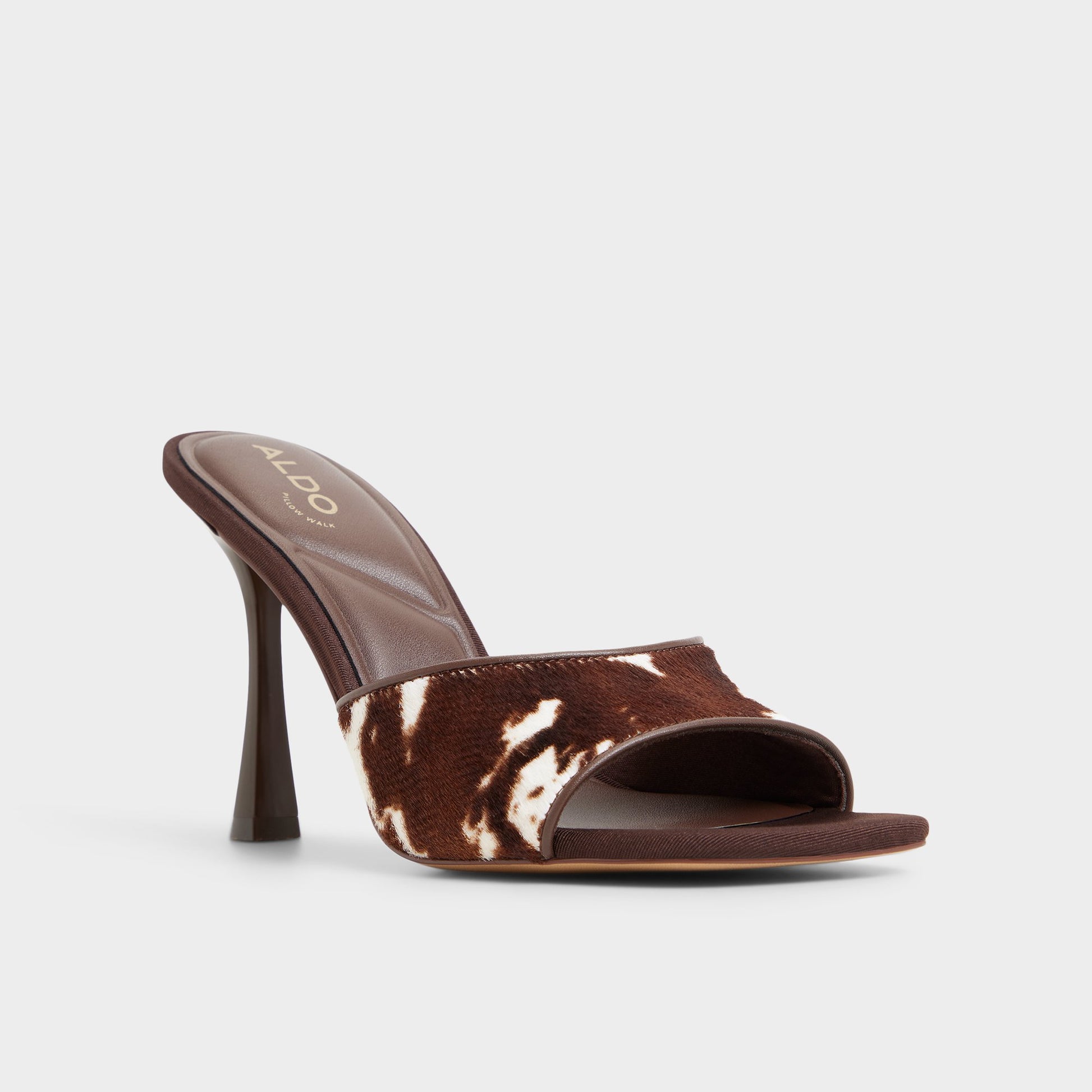 Three-quarter angle of Open Brown Evadalia Heeled mule's front side