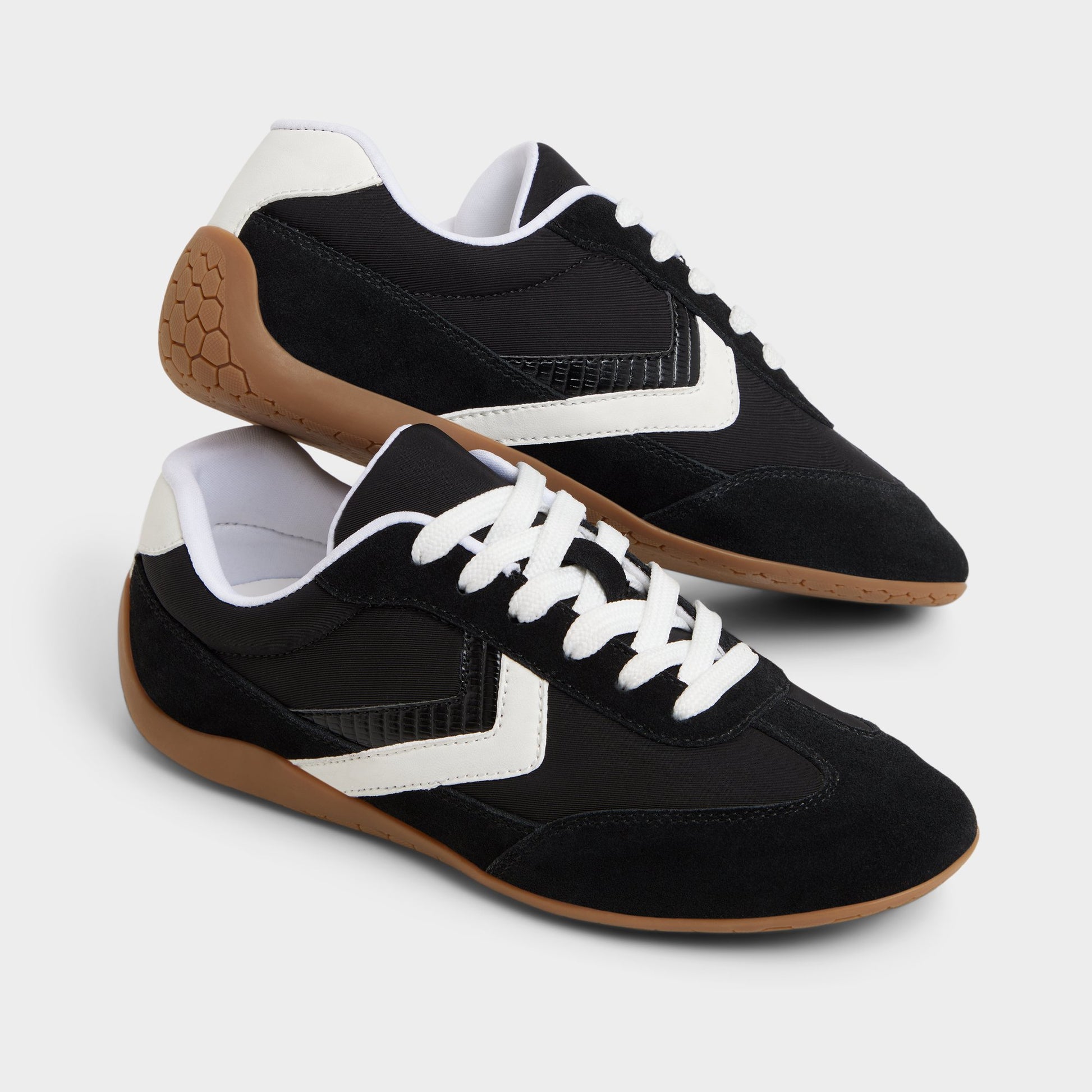 Highlighted view of a pair of Black Coolchic Jogger sneakers