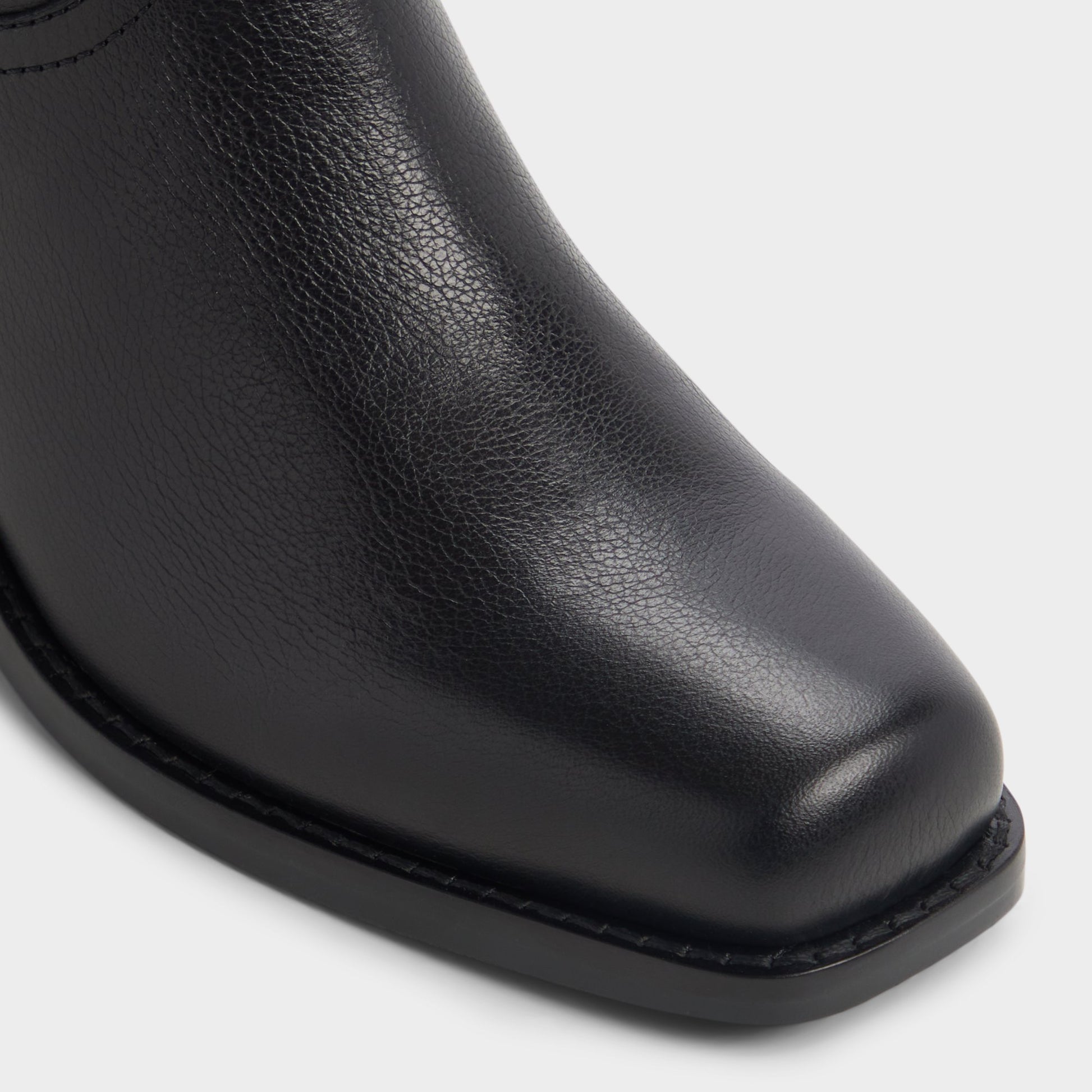 Close-up of the Black Emberlyn Knee-high western boot