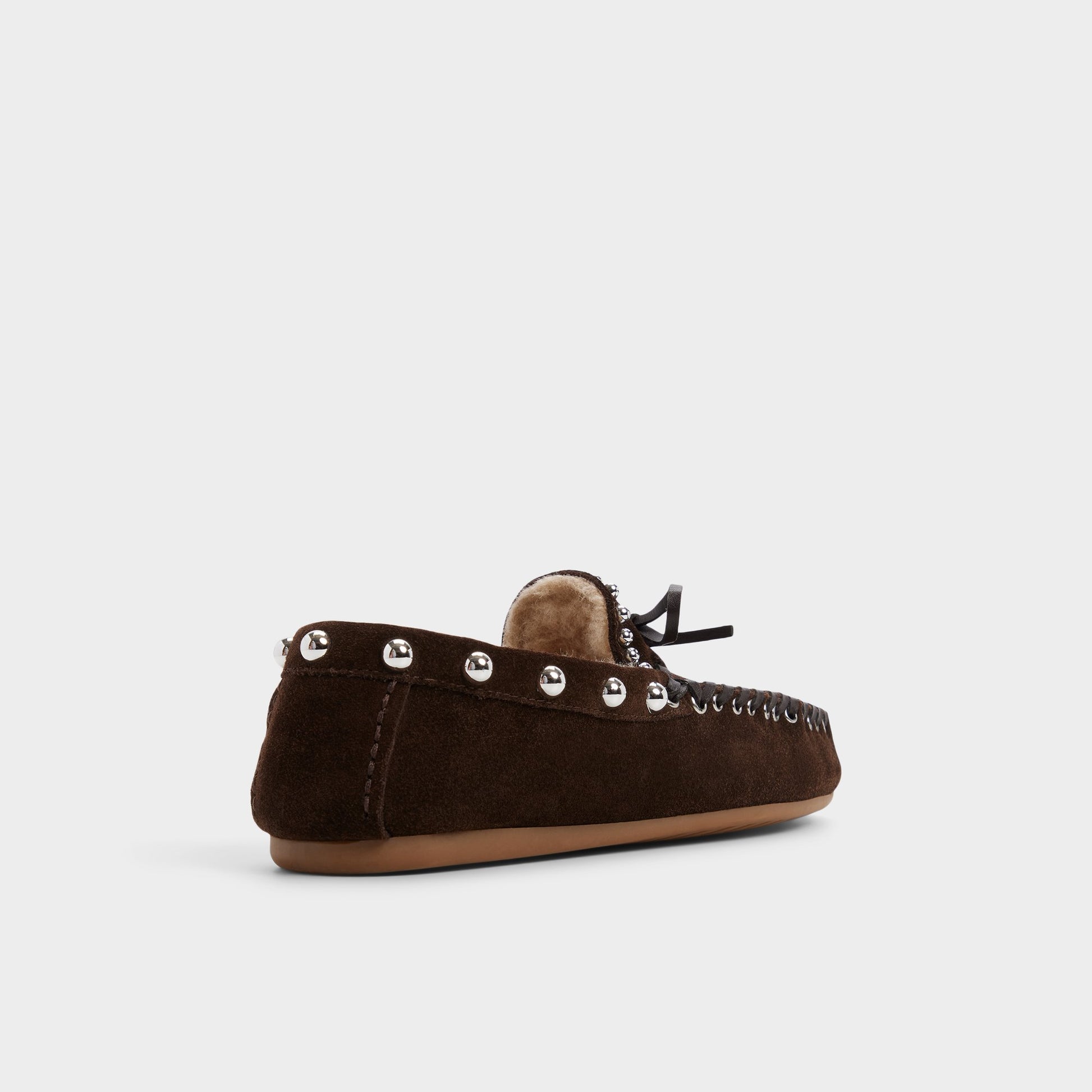 Angle de trois quarts de l'arrière de Marron Foncé Patricie Boat shoe