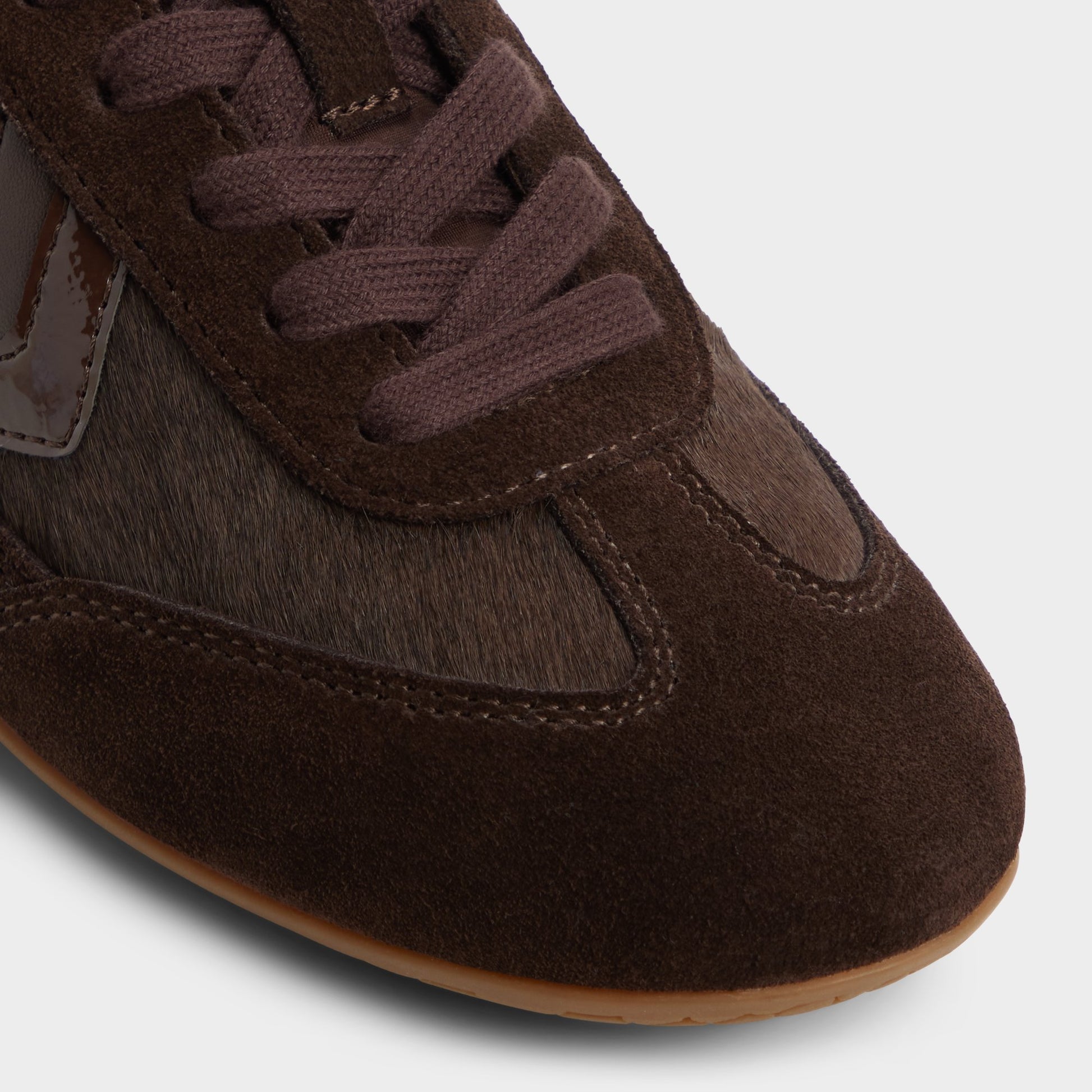 Close-up of the Dark Brown Coolchic Jogger sneaker