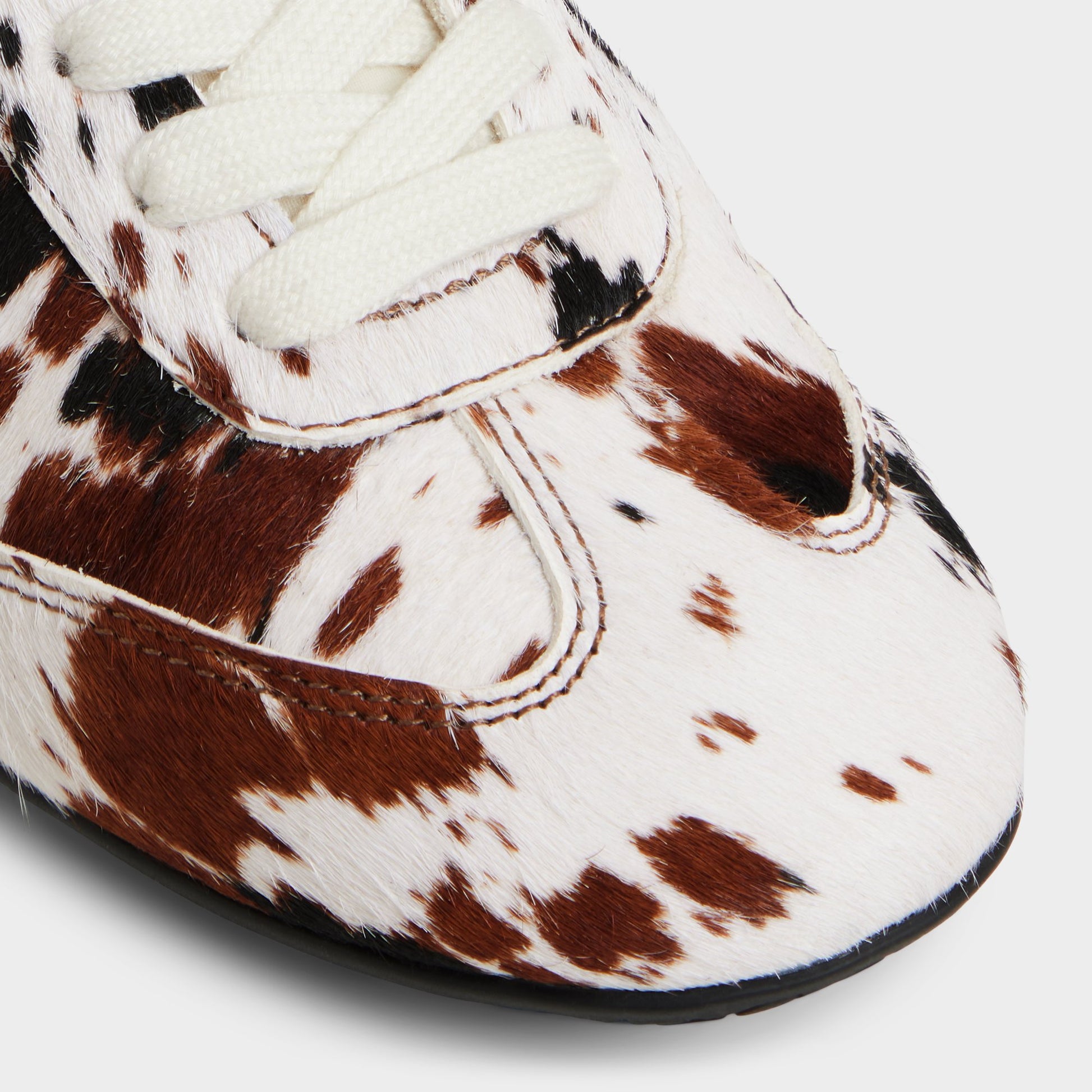 Close-up of the White Combo Coolchic Jogger sneaker