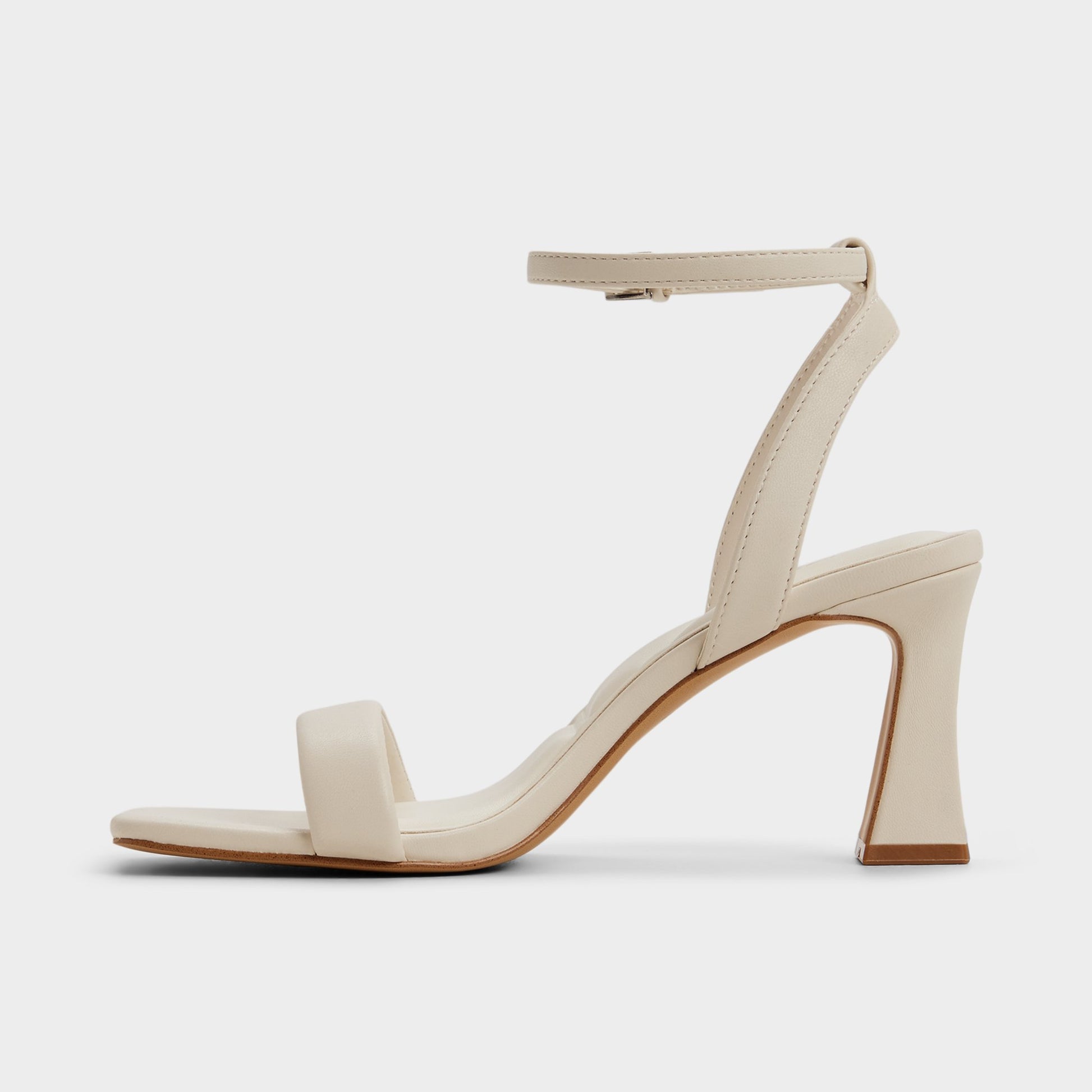 Side view of White/bone Austorai Strappy heeled sandal