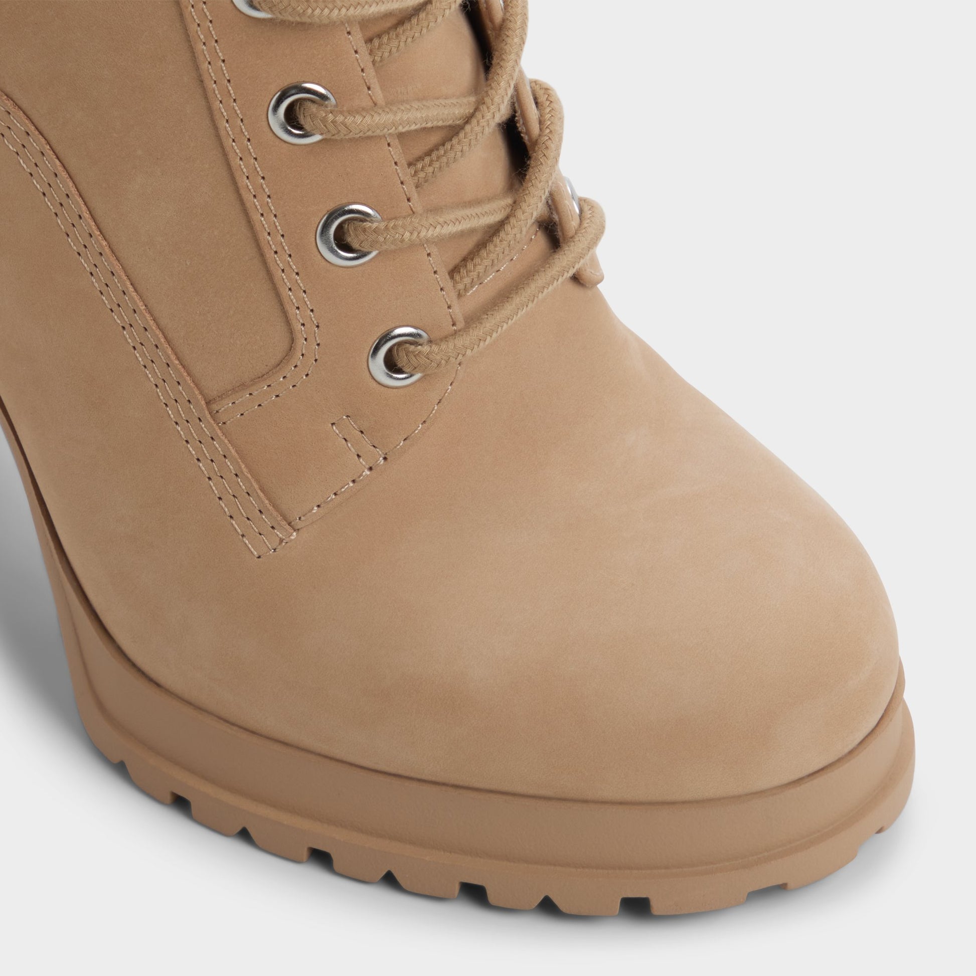 Close-up of the Medium Beige Rebelliously Combat ankle boot