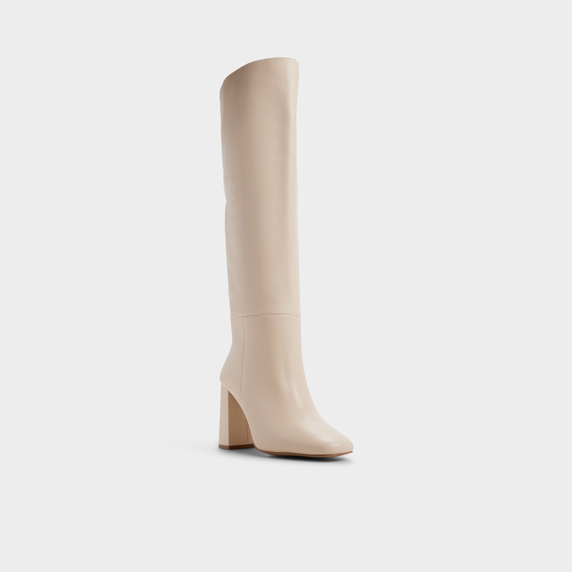 Three-quarter angle of Cream Helana Knee-high boot's front side