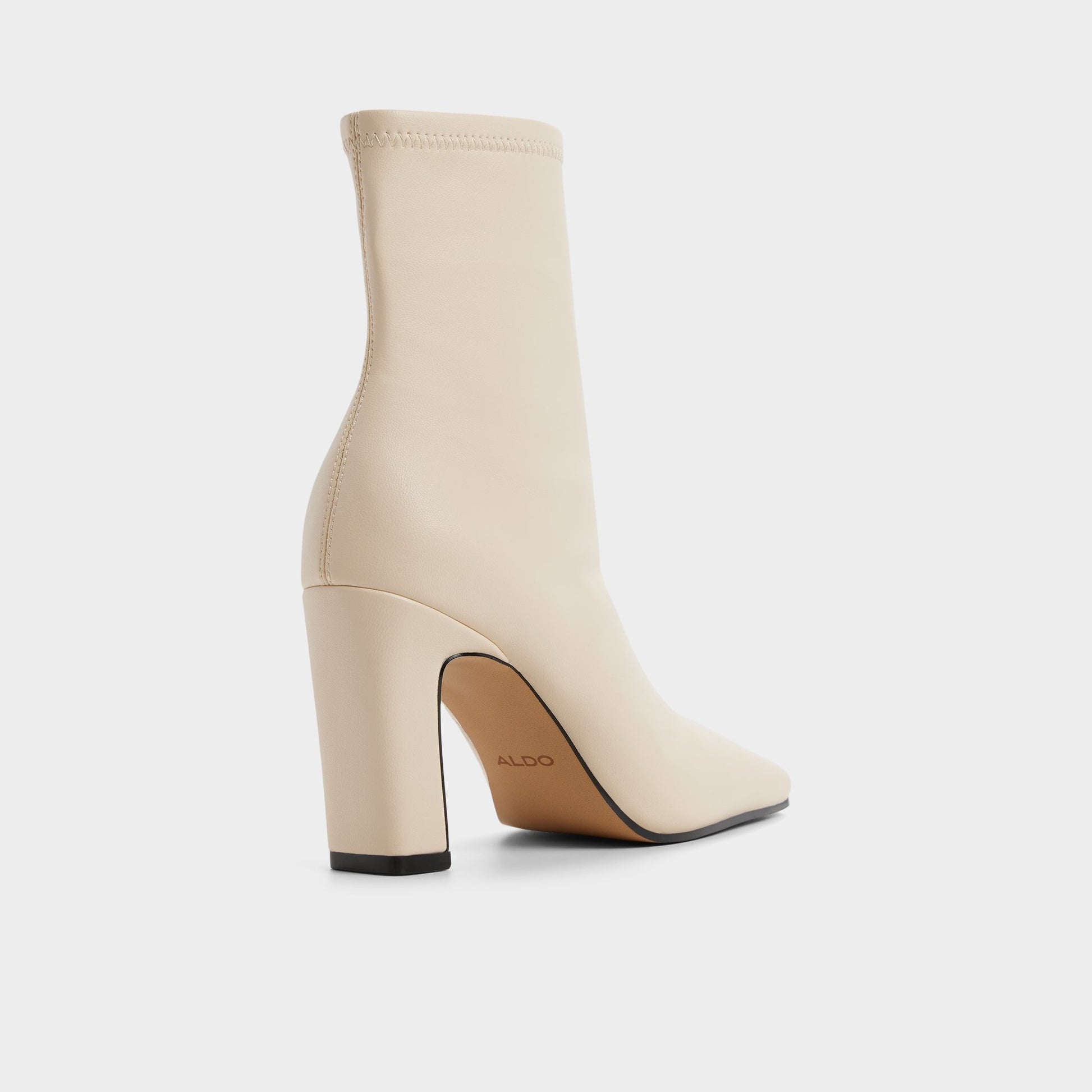 Three-quarter angle of Cream Cybele Ankle boot's back side