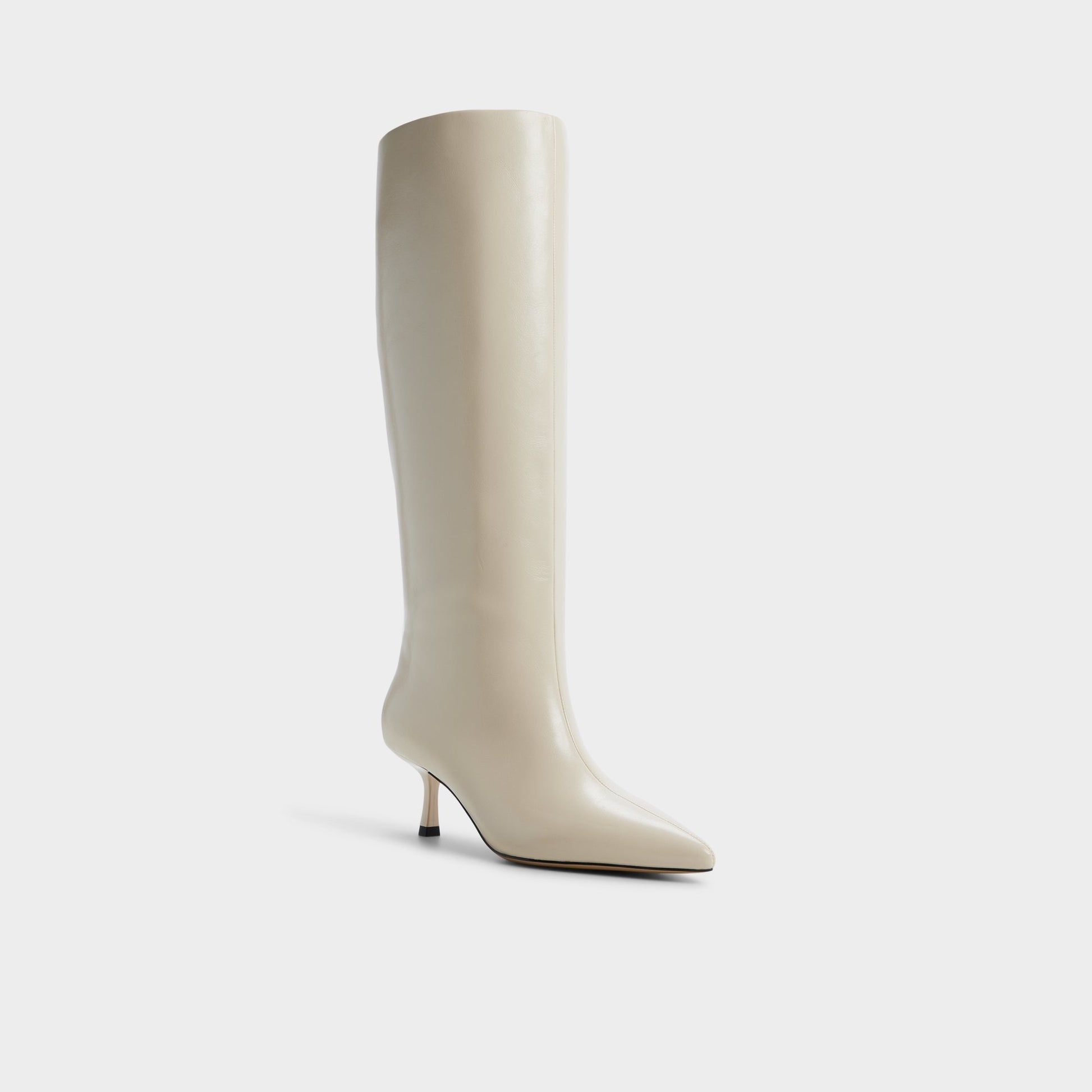 Three-quarter angle of Cream Selora Knee-high boot's front side