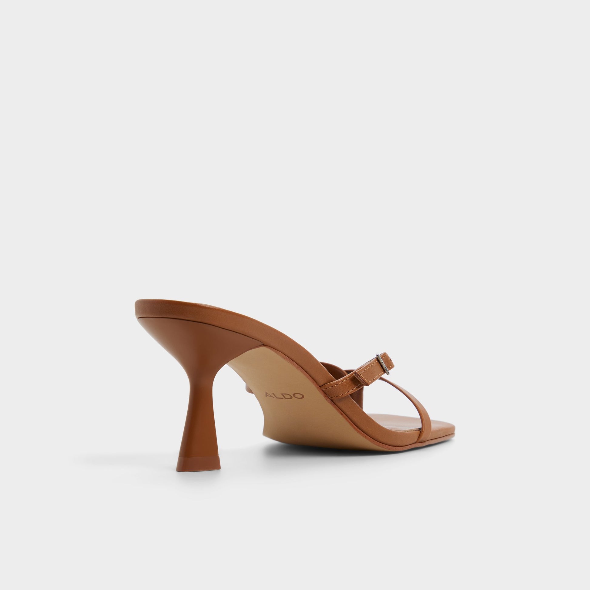 Three-quarter angle of Medium Brown Gannever Heeled flip flop's back side