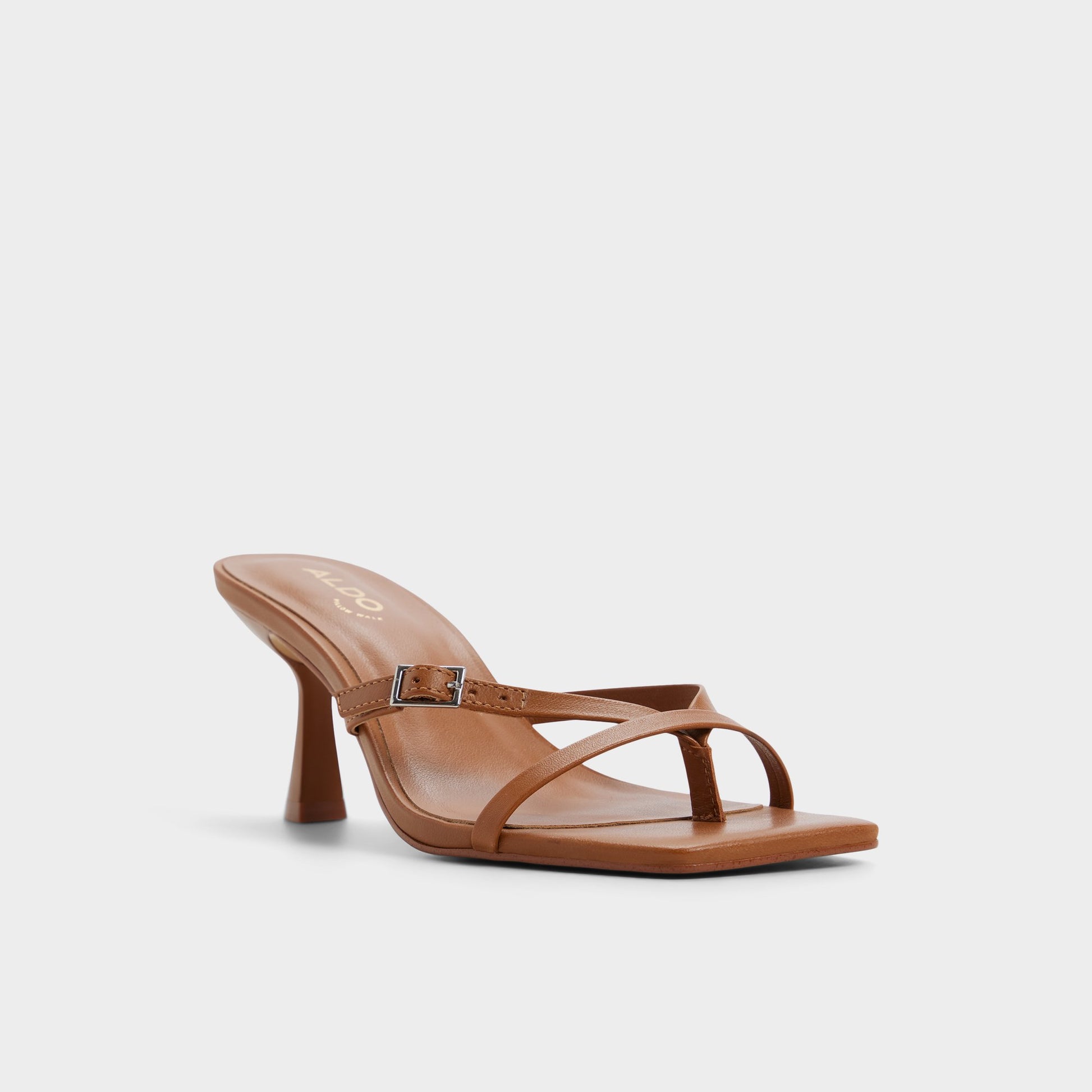 Three-quarter angle of Medium Brown Gannever Heeled flip flop's front side