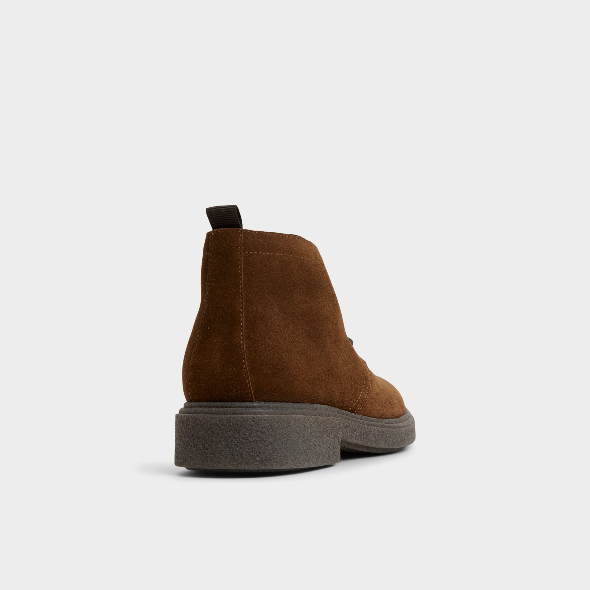 Three-quarter angle of Open Brown Torroo Chukka boot's back side