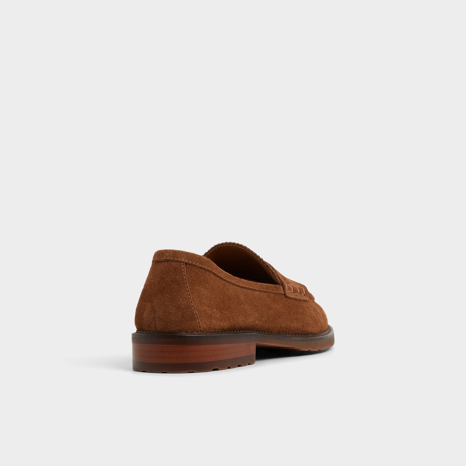 Three-quarter angle of Cognac Melvillee Loafer's back side