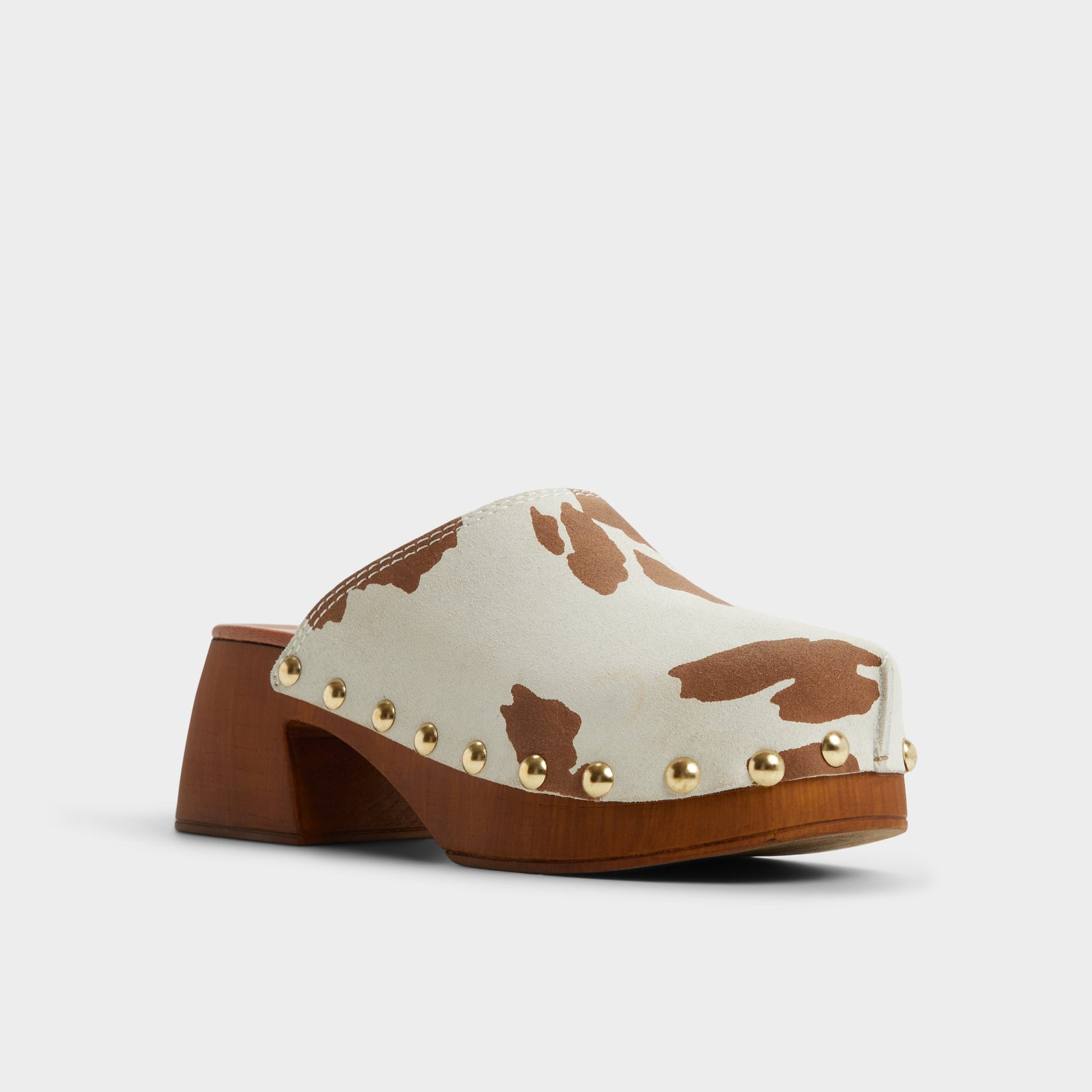 Three-quarter angle of Open Brown Tayloria Clog's front side