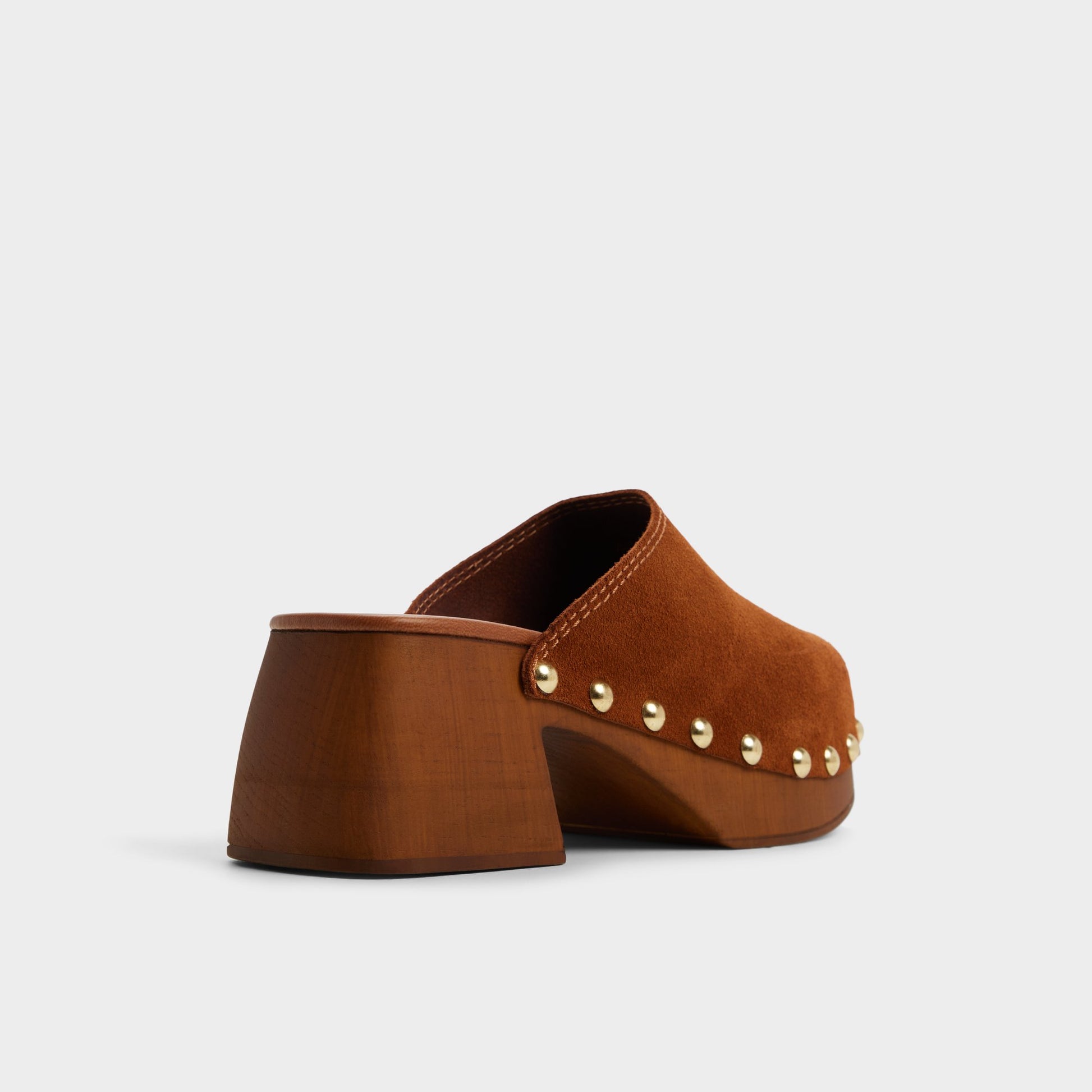 Three-quarter angle of Tan Tayloria Clog's back side