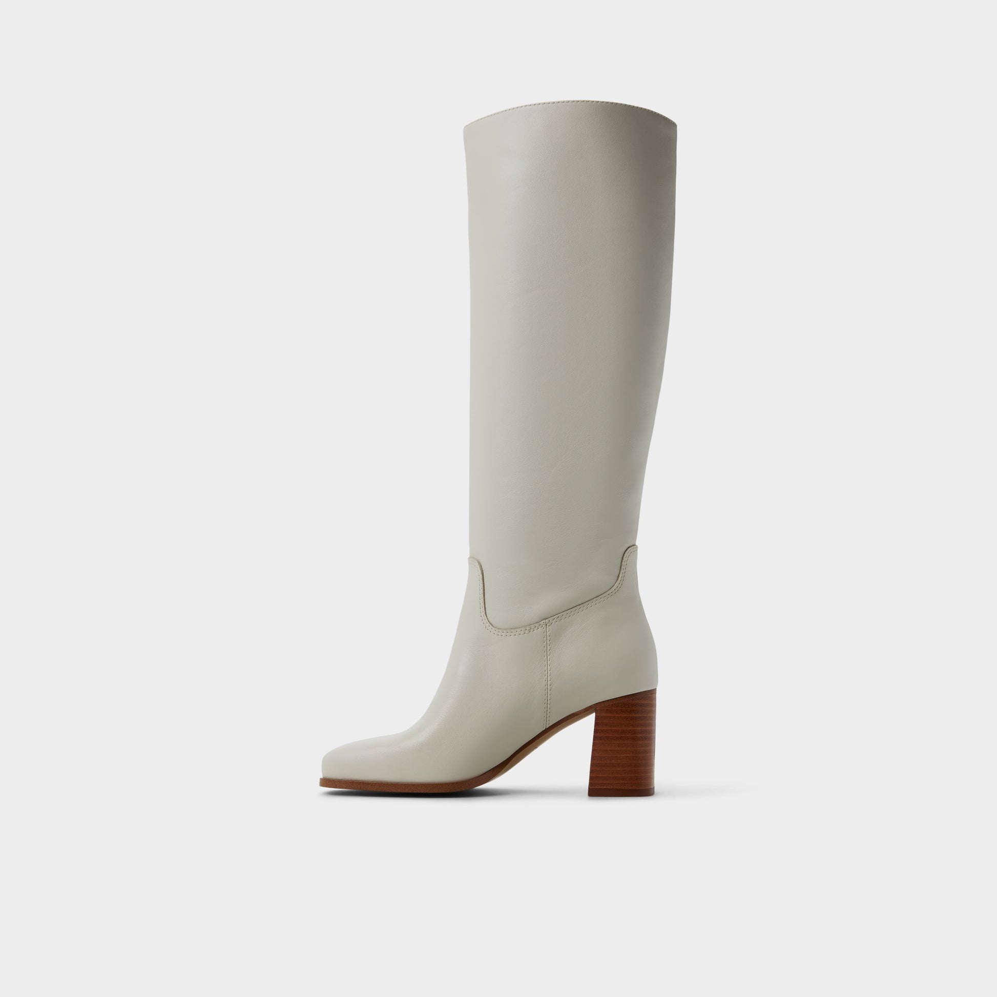 Side view of White/bone Elyze Knee-high boot