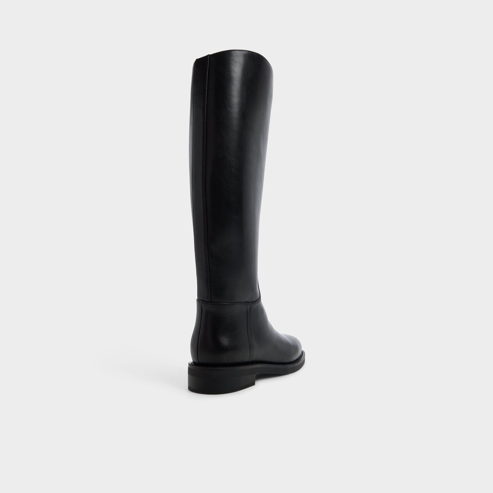 Three-quarter angle of Black Charley Knee-high boot's back side
