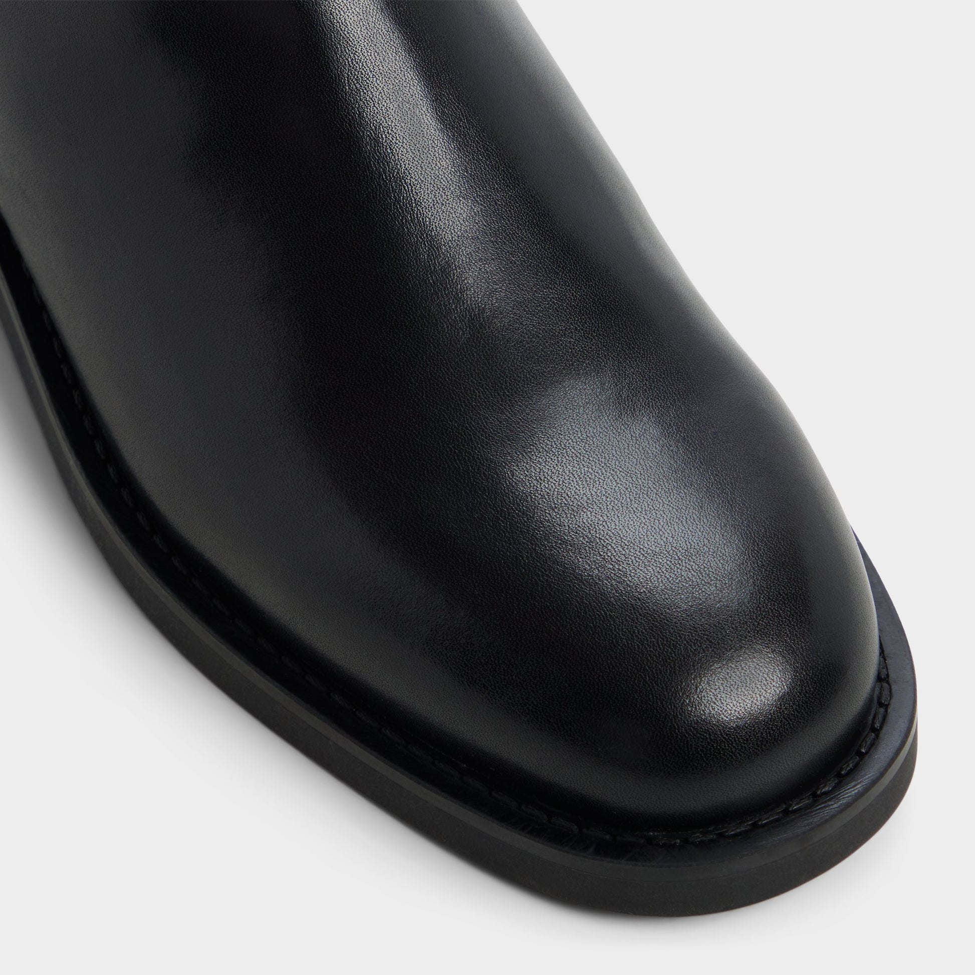 Close-up of the Black Charley Knee-high boot