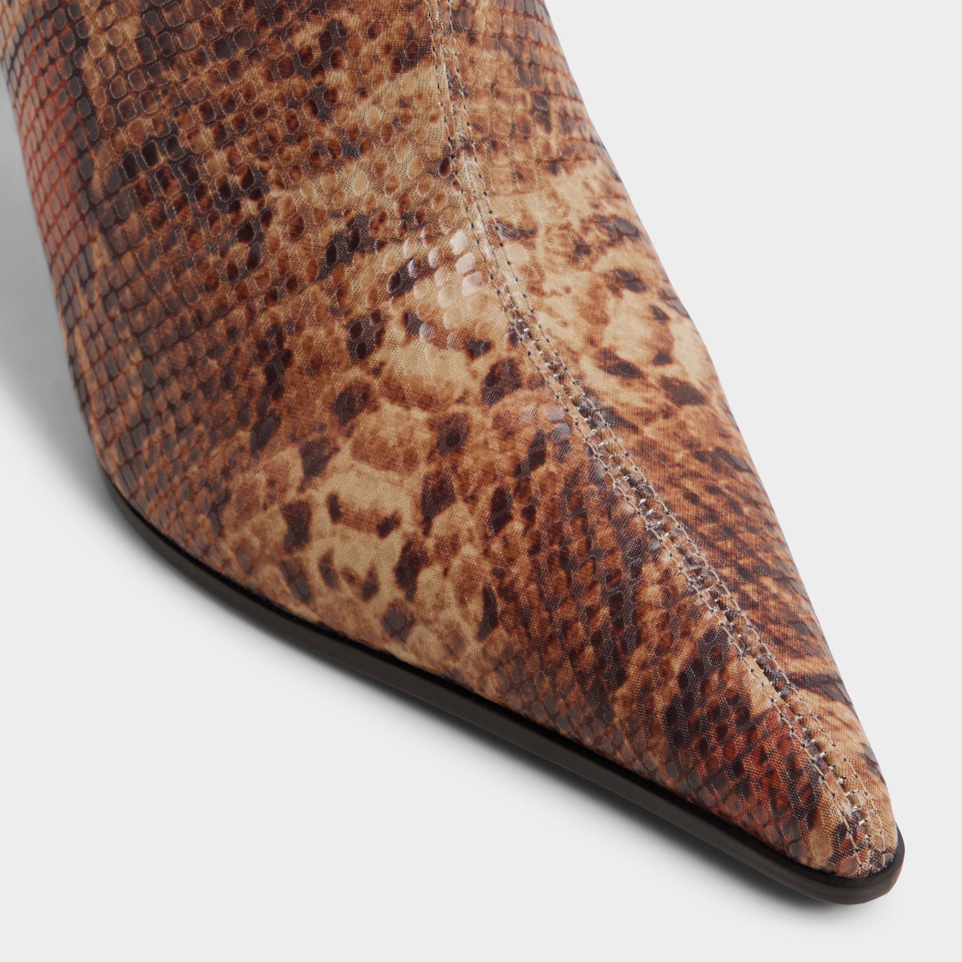 Close-up of the Brown multi Re-emily Knee-high boot