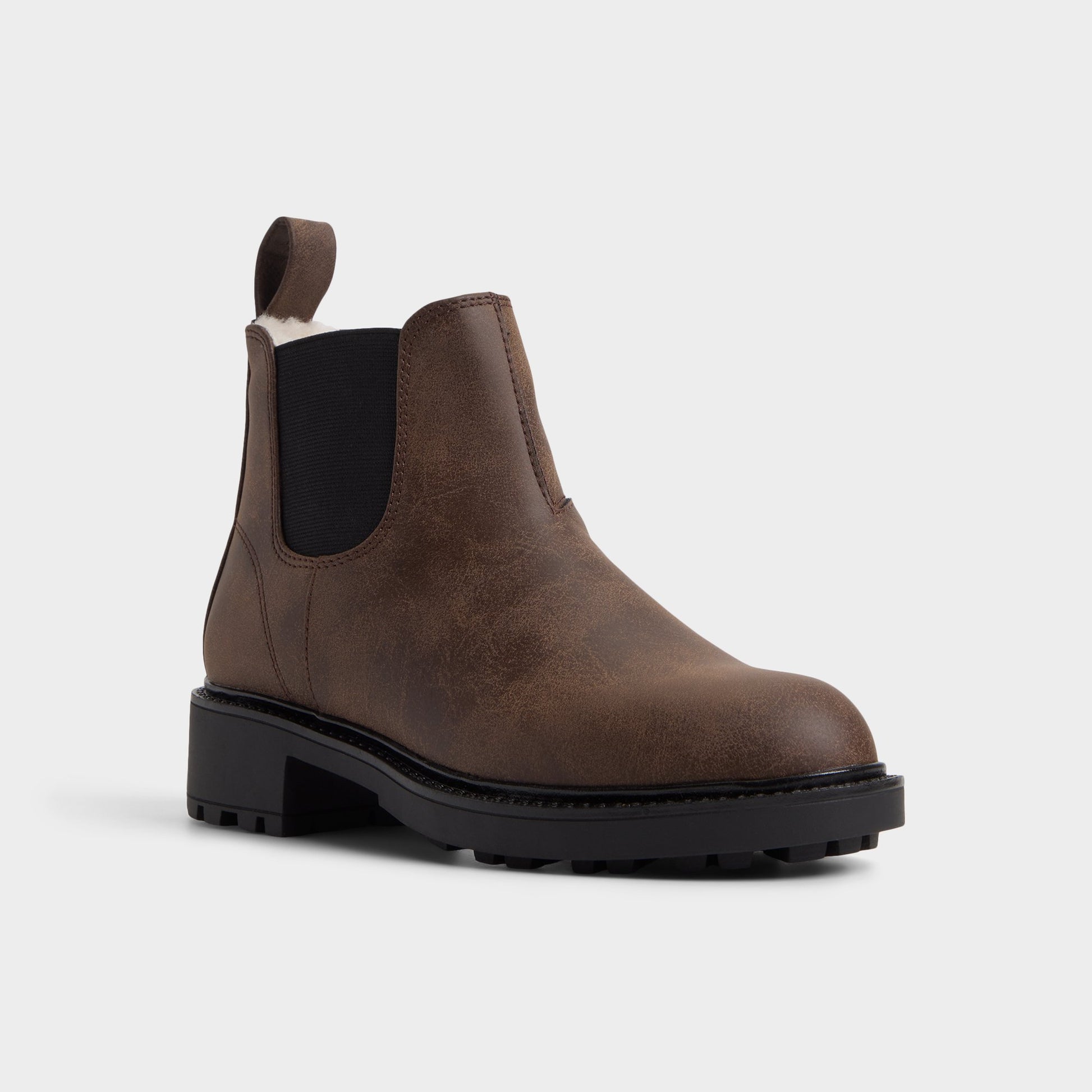 Three-quarter angle of Dark brown Faverwham Chelsea boot's front side