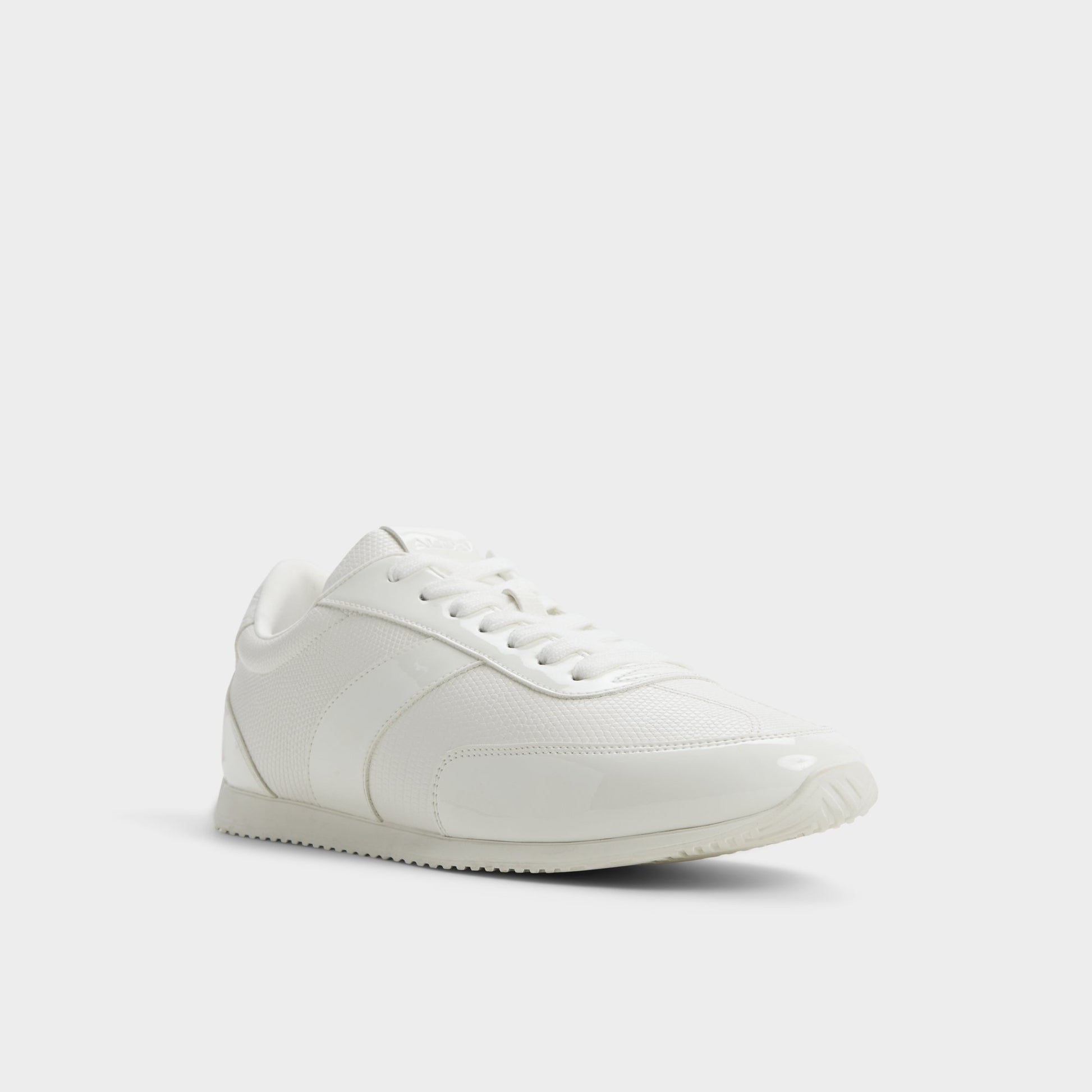Three-quarter angle of White combo Nathaniell Low top sneaker's front side