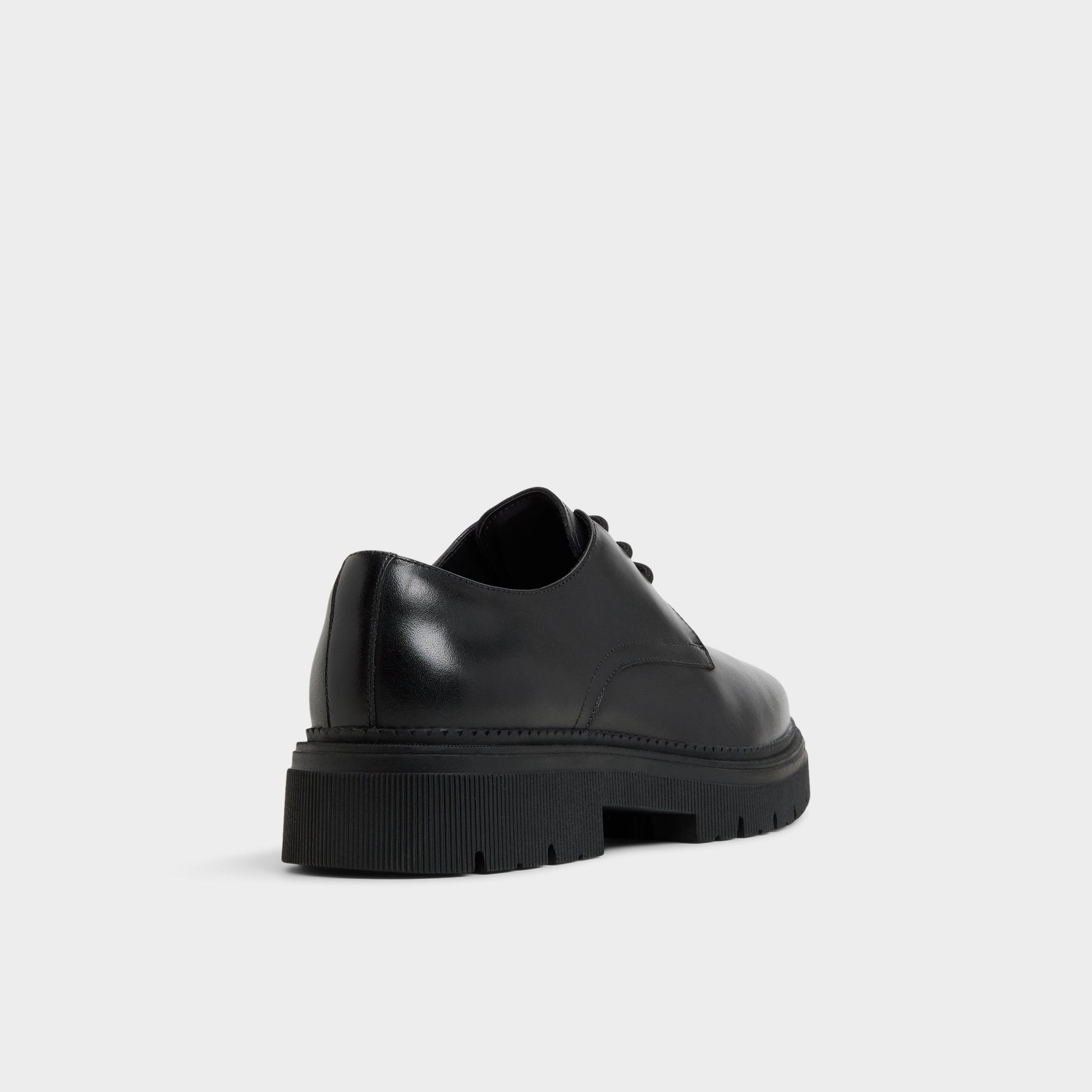 Three-quarter angle of Black Simian Derby shoe's back side