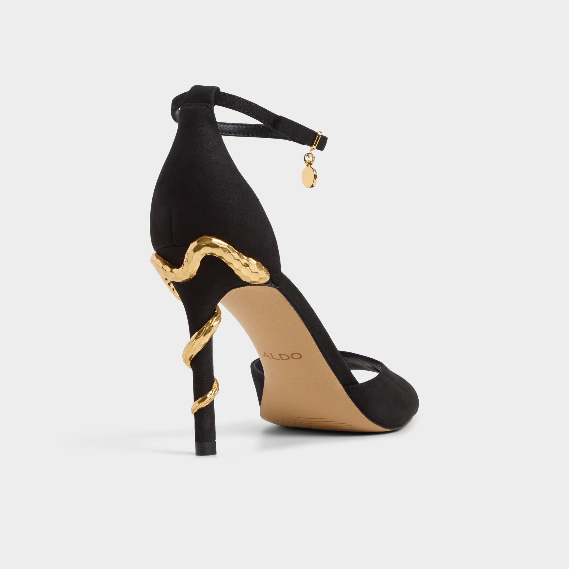 Three-quarter angle of Black Medeza Strappy heeled sandal's back side