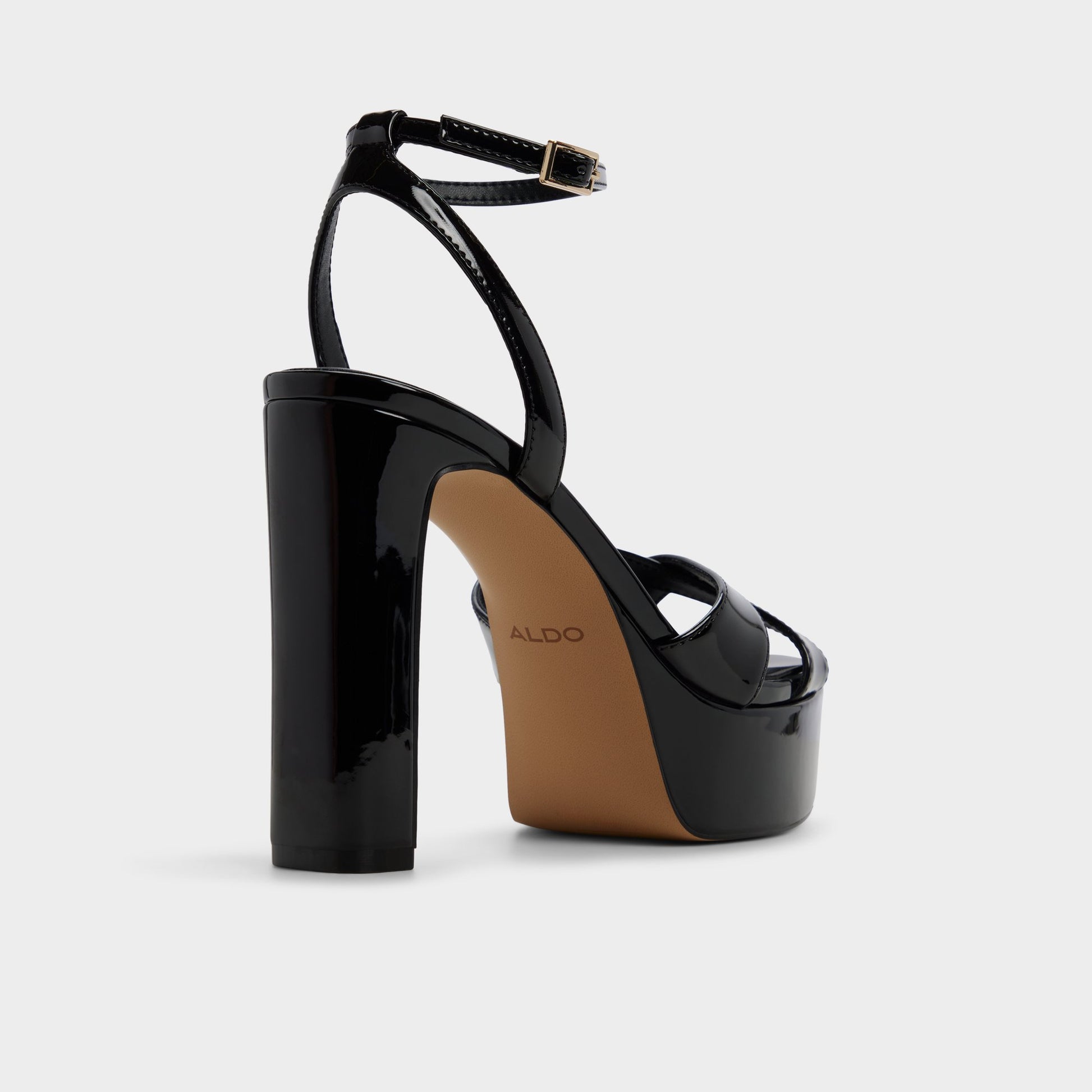 Three-quarter angle of Black Rosine Strappy heeled sandal's back side