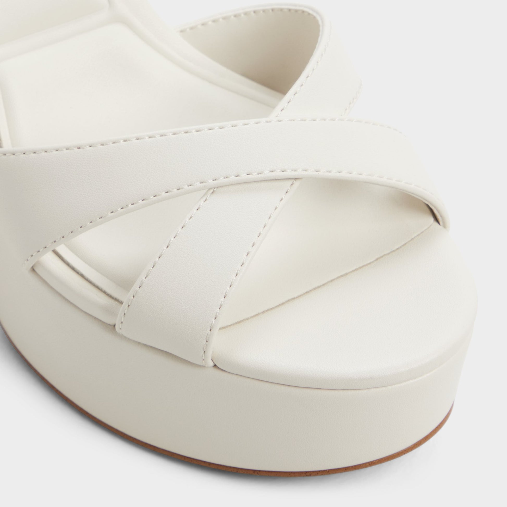 Close-up of the White/bone Rosine Strappy heeled sandal
