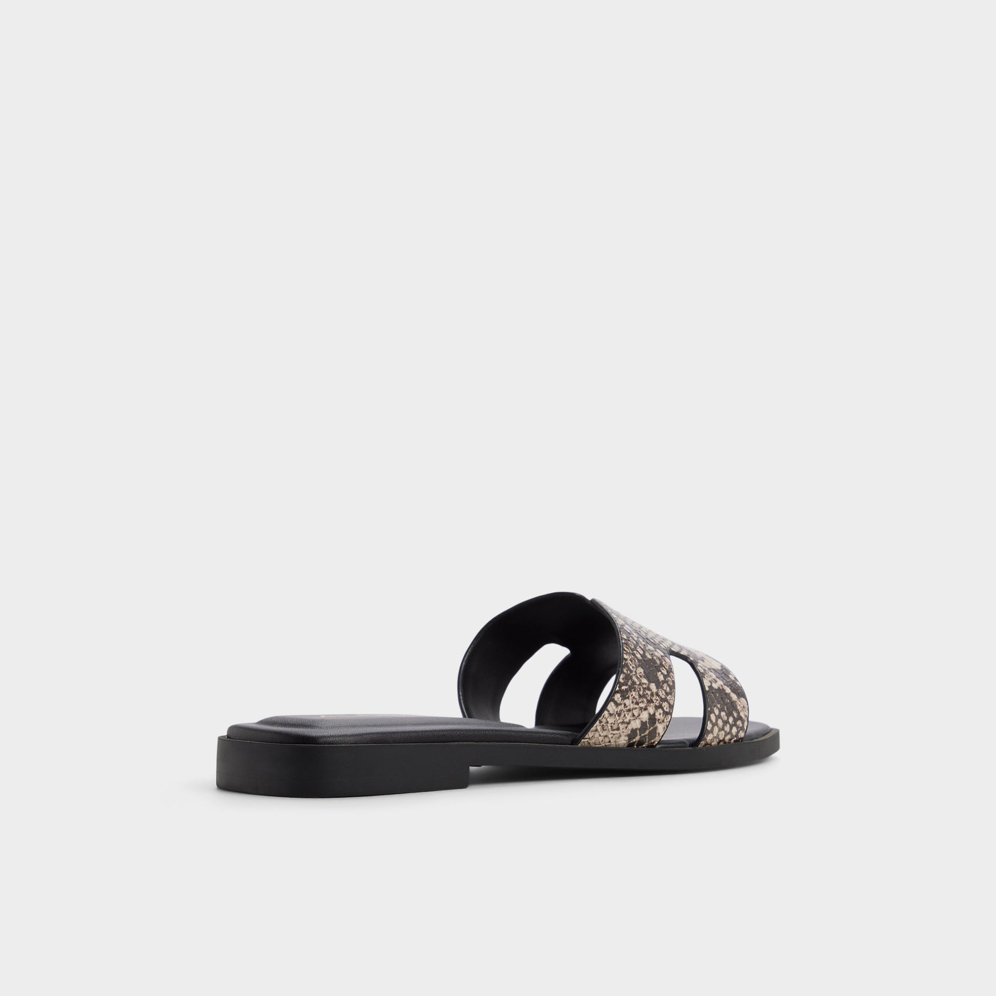 Three-quarter angle of Open brown Itsandal Slide sandal's back side